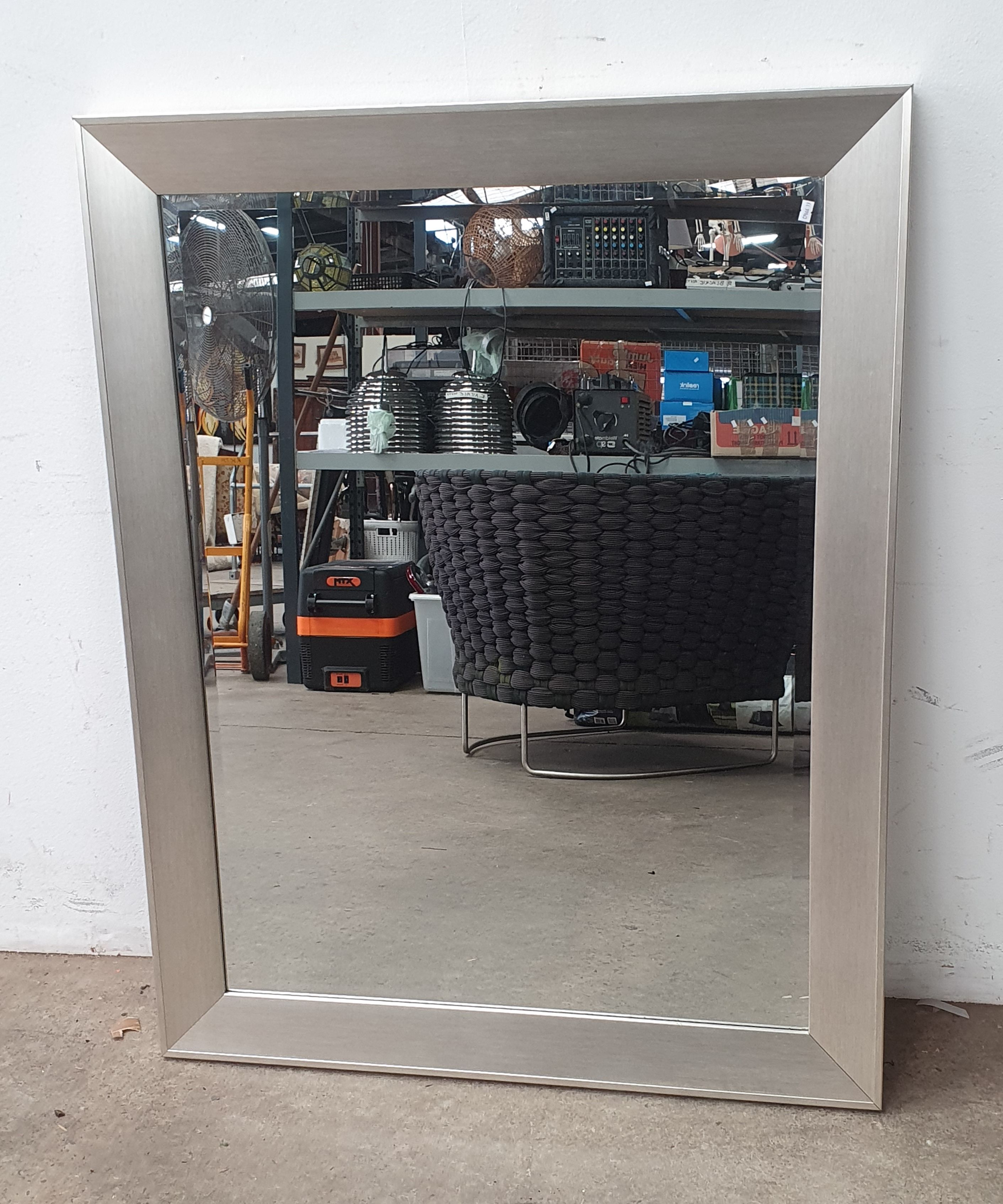 A Large Bevelled Edge Mirror