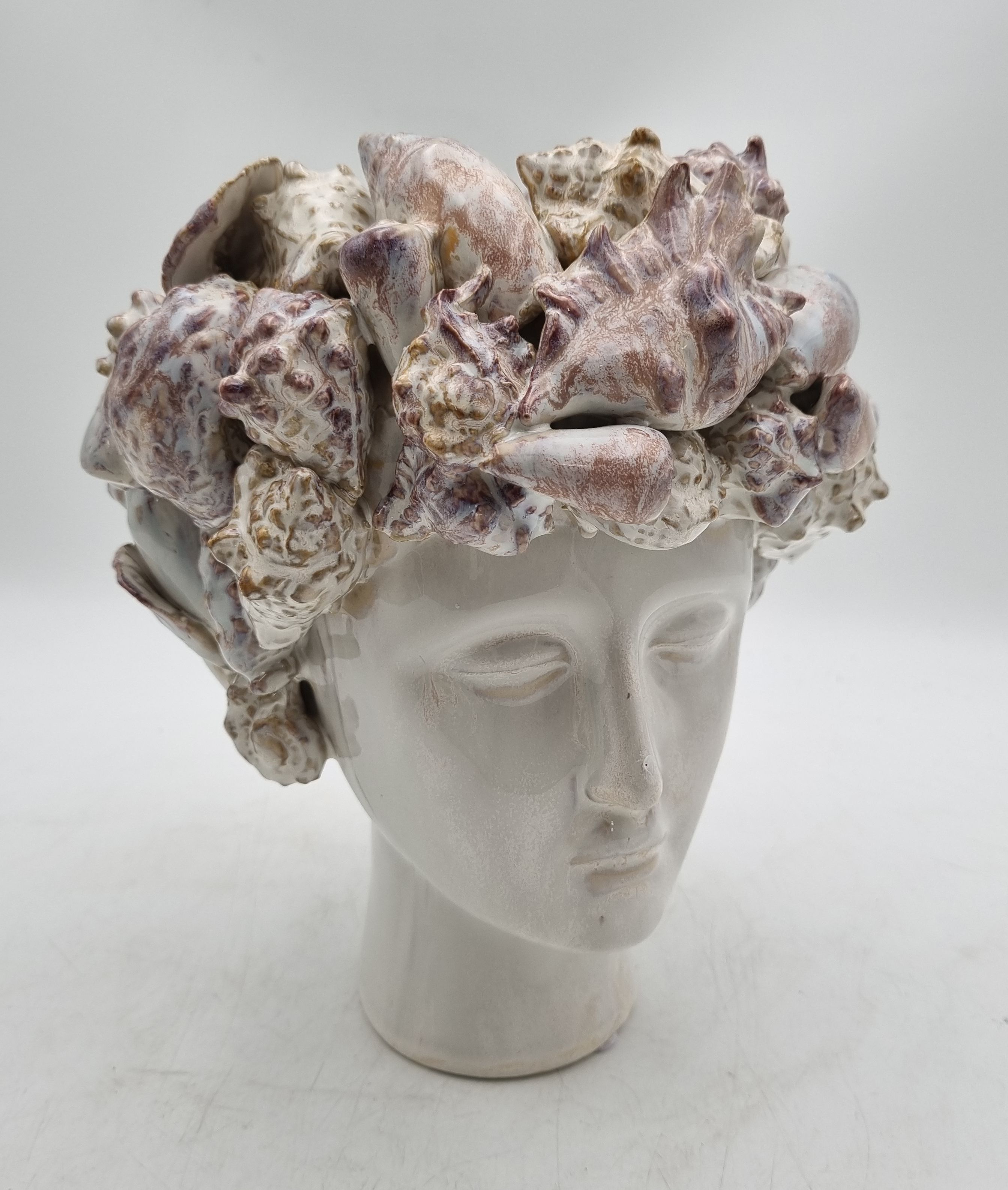 A CERAMIC HEAD VASE