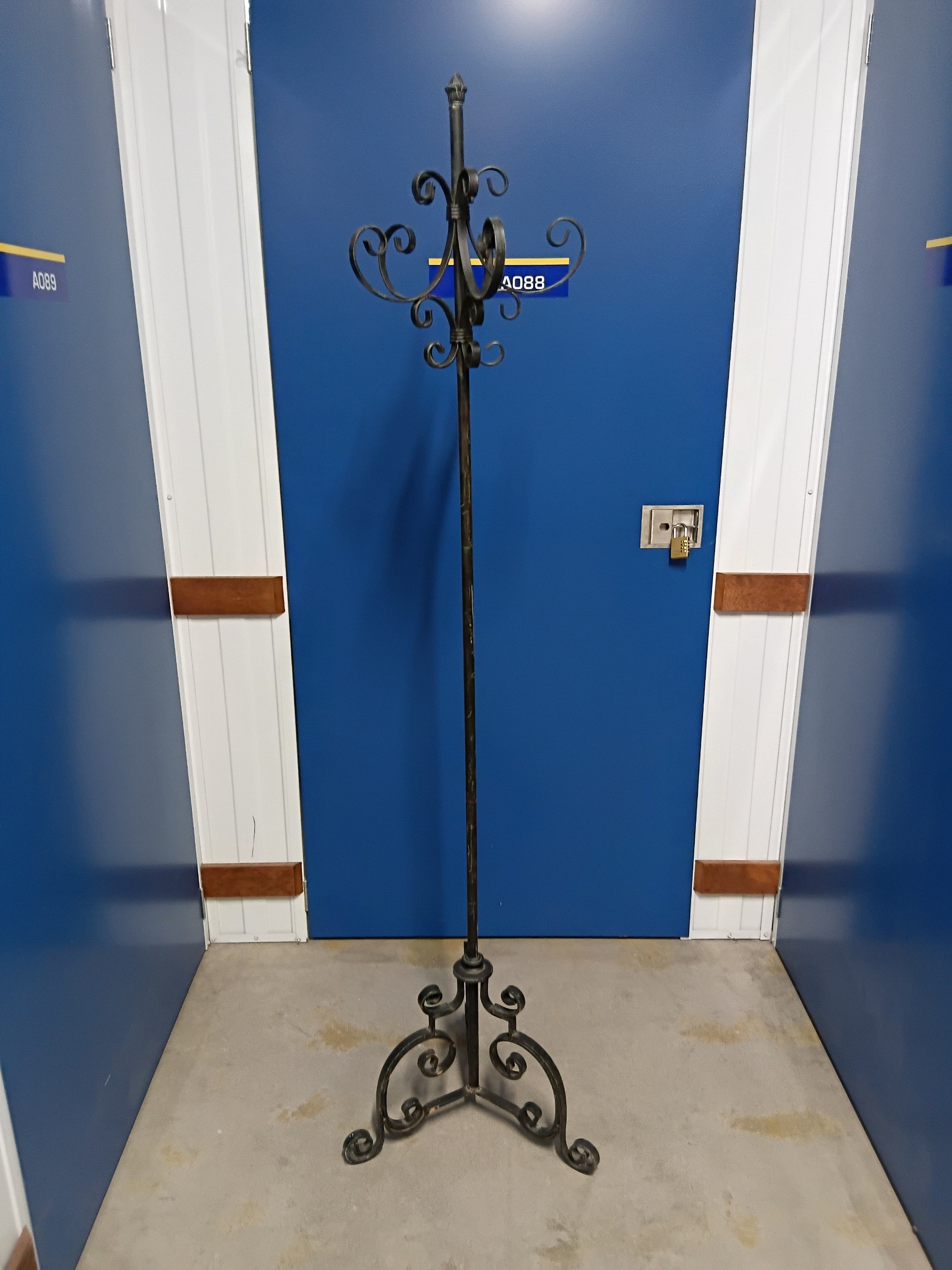 A Wrought Iron Coat Rack