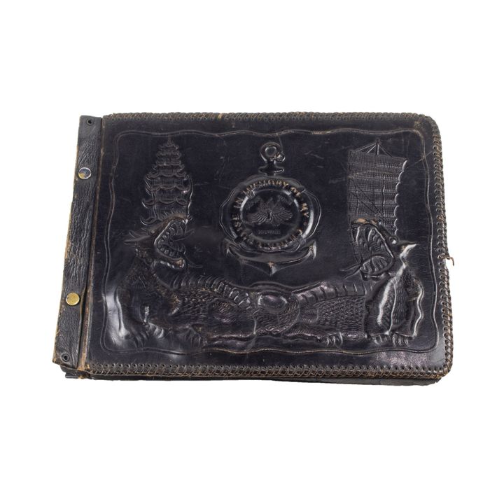 A Navy photo album "In Memory of my China Cruise", circa 1934, leather embossed photo album of Navyman Charles Krusesky