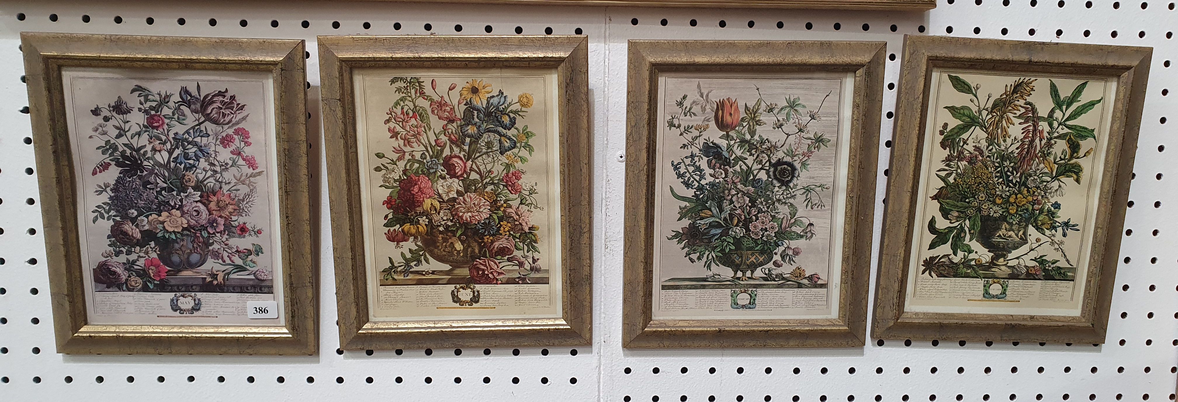386 · A SET OF FOUR FRAMED FLORAL ILLUSTRATIVE PRINTS