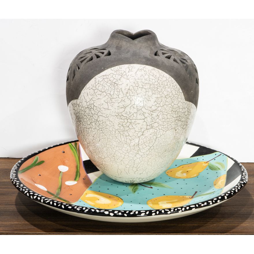 A Droll Designs platter painted with pears with Neiman Marcus retailer sticker