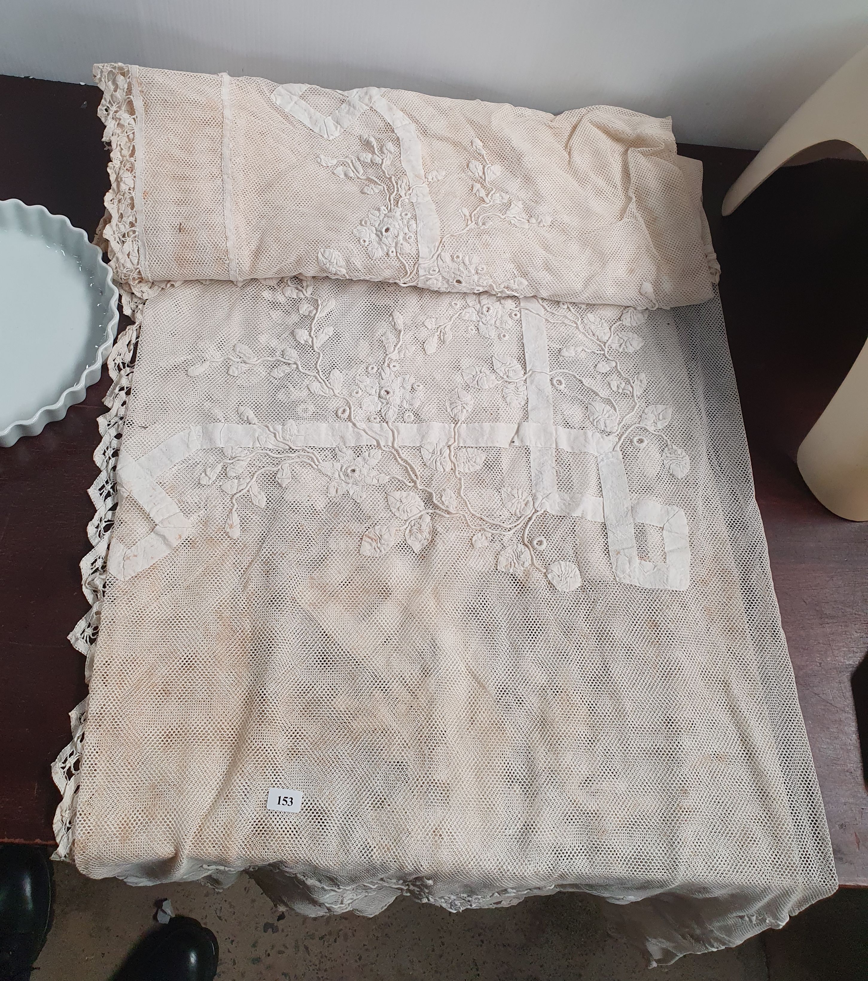 AN ANTIQUE NET AND EMBROIDERED-APPLIQUE RECTANGULAR CLOTH