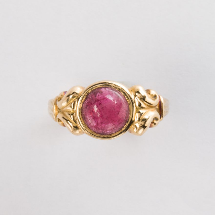 A pink tourmaline and eighteen karat gold ring