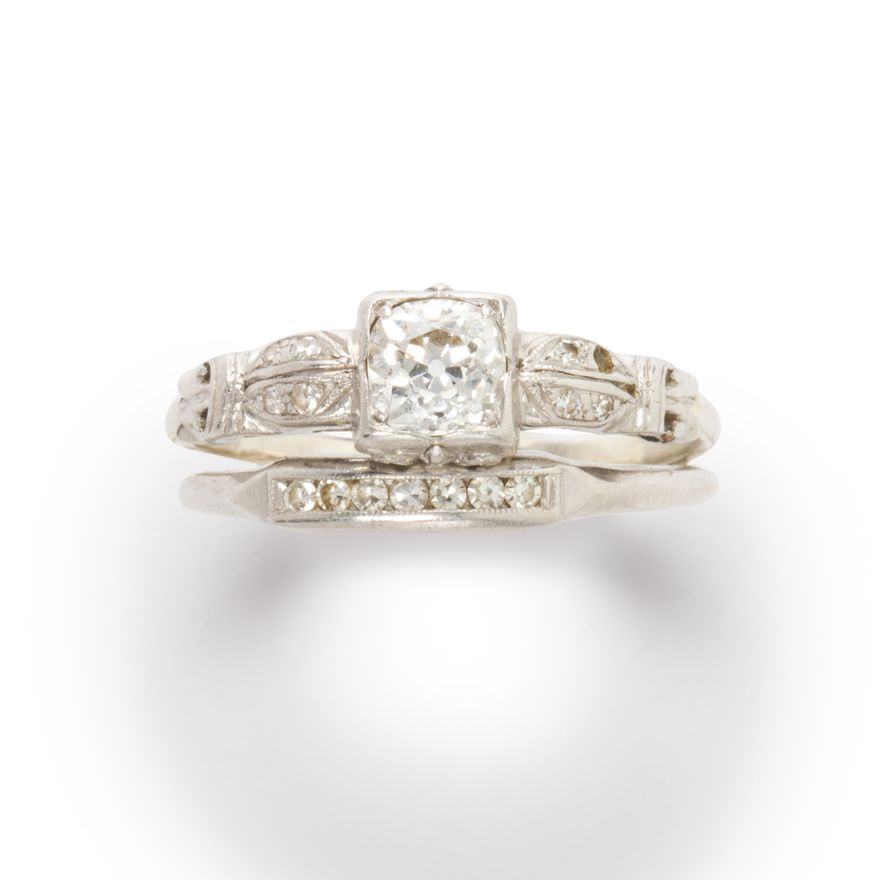 An Art Deco diamond and platinum wedding ring set