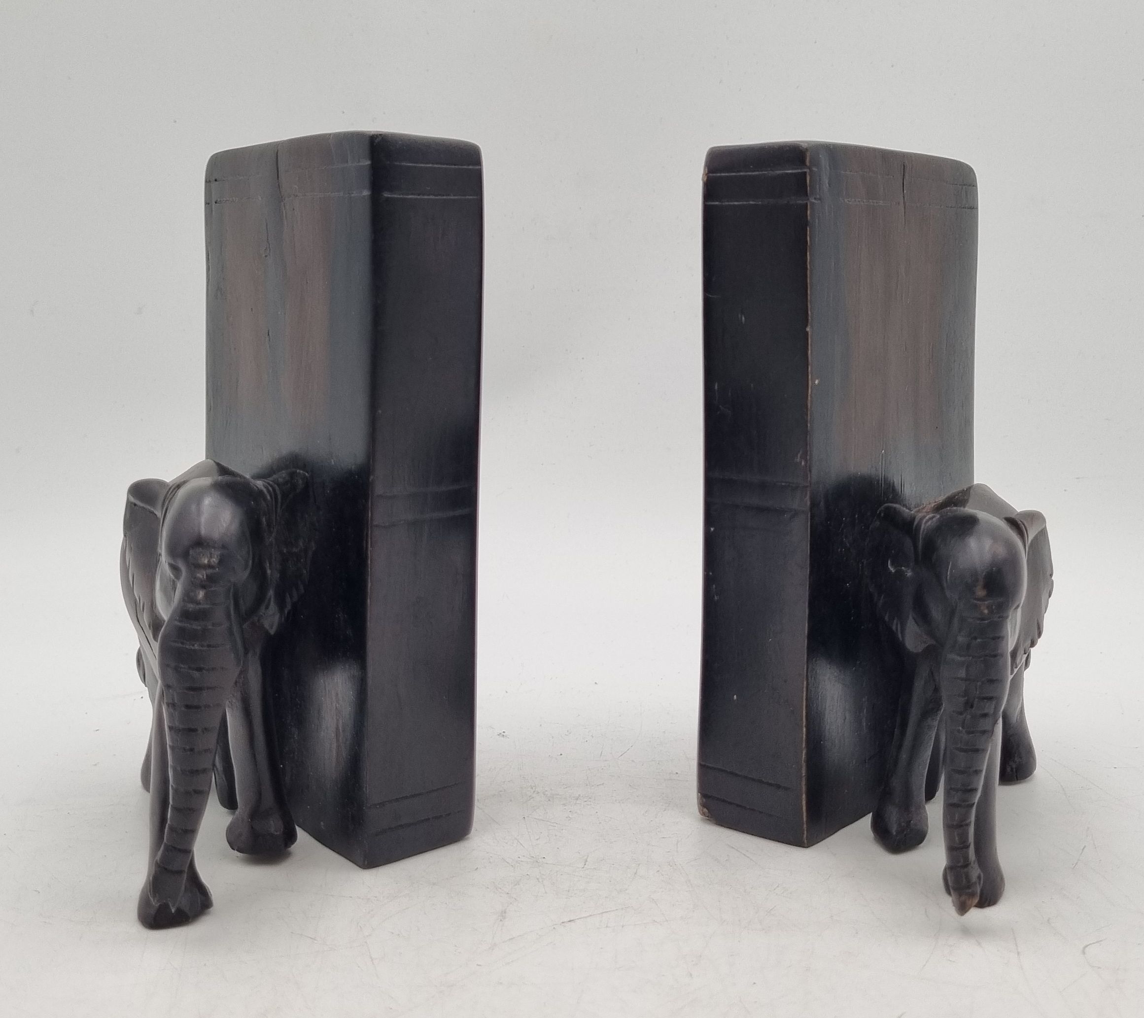 A Good Pair Of Carved Ebony Elephant Bookends