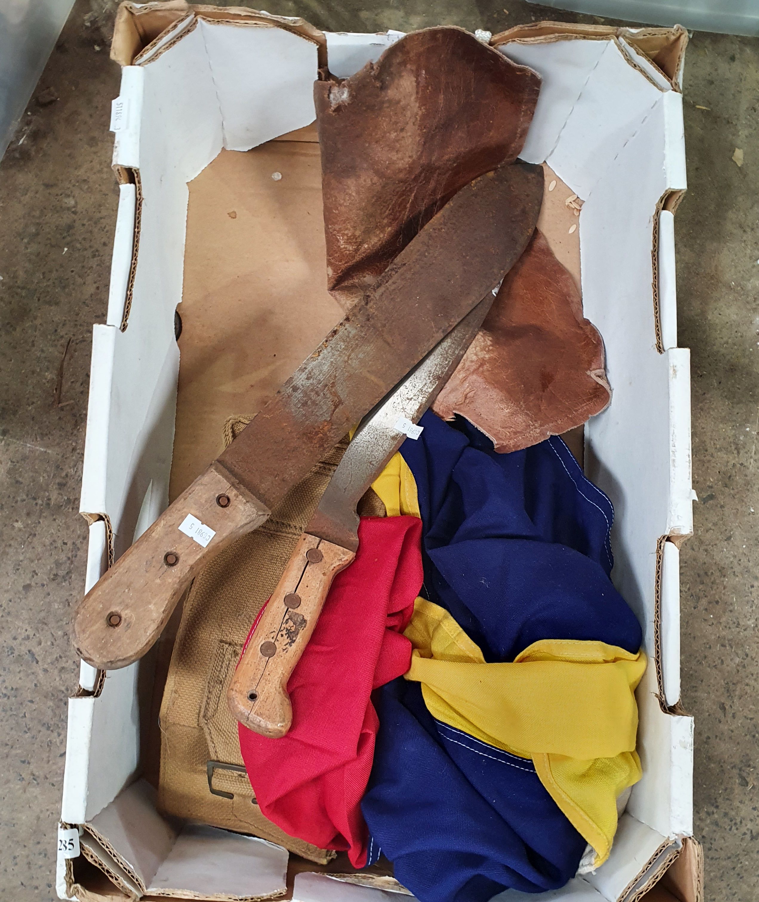 1285 · TWO WOODEN HANDLED MACHETES