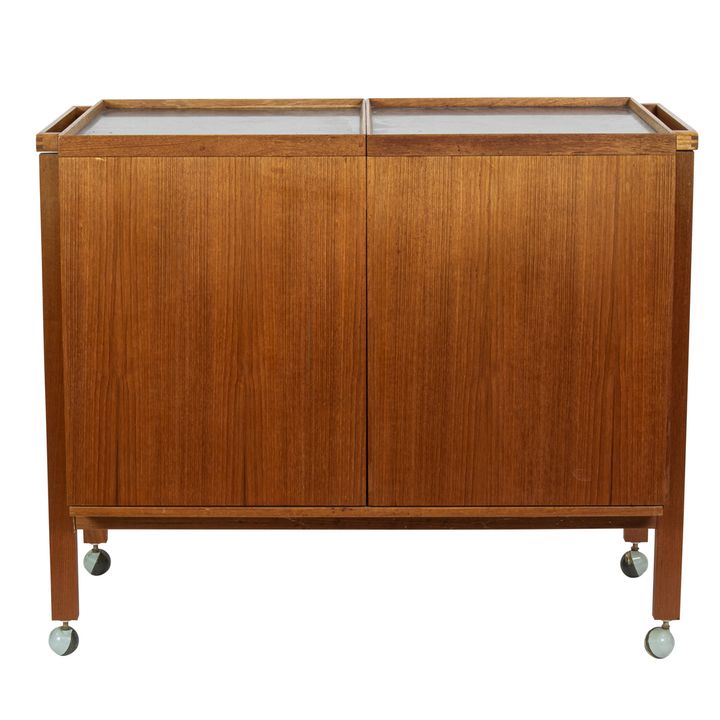 A Danish teak rolling bar cart