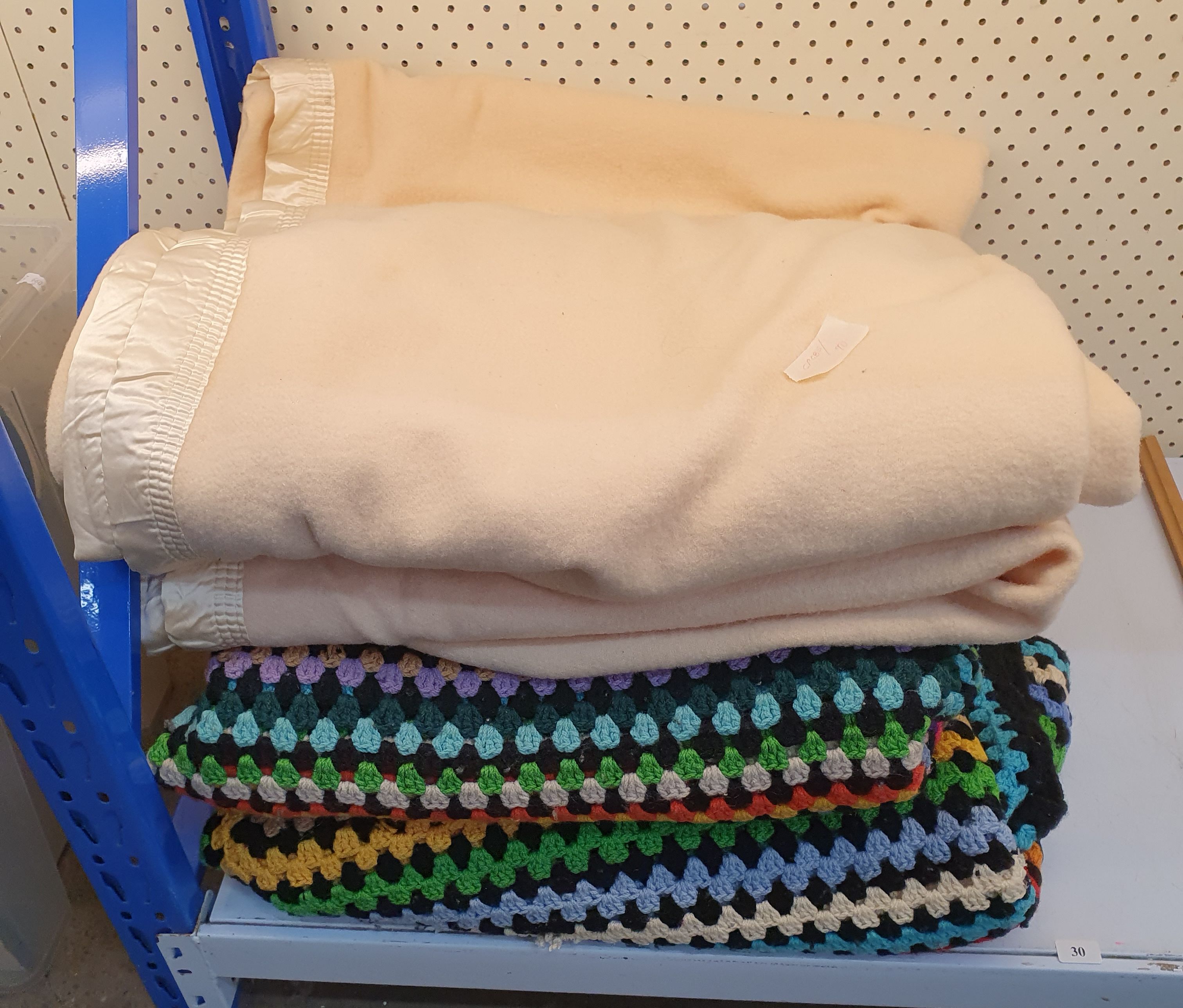 21 · TWO VINTAGE CROCHETED RUGS AND A PAIR OF SINGLE BED ONKAPARINGA BLANKETS