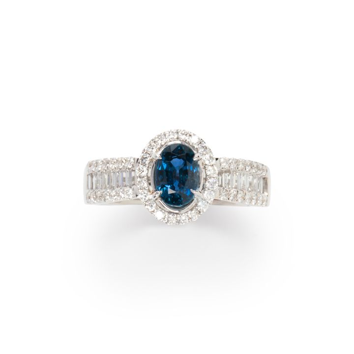 An unheated sapphire and diamond ring