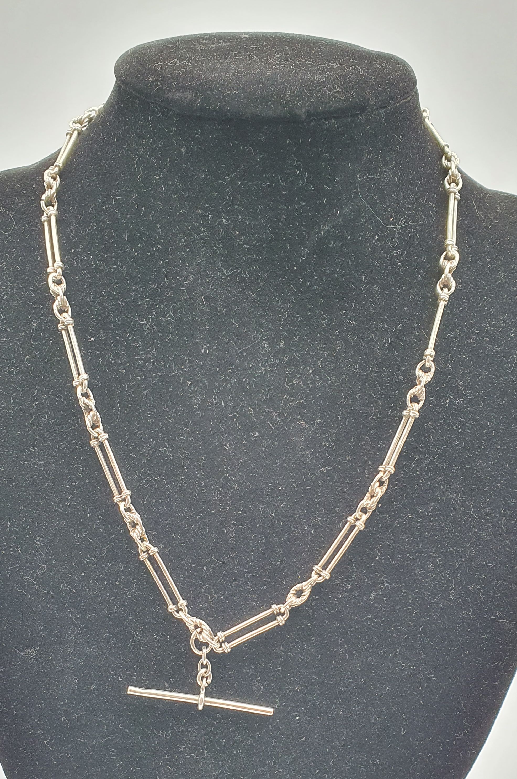 295 · A VINTAGE SILVER FOB CHAIN