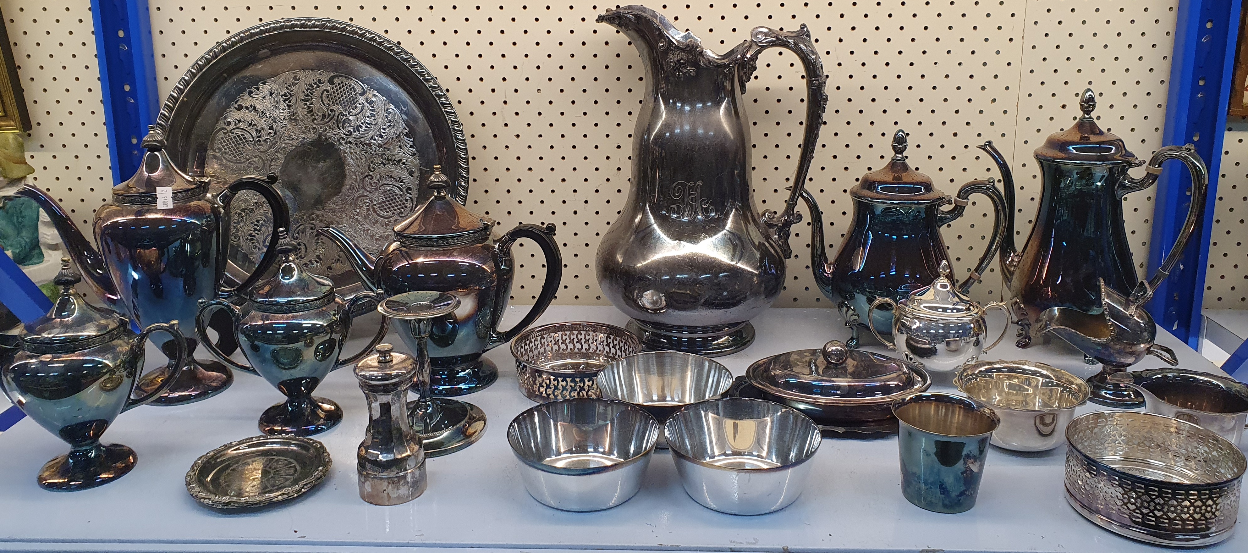 18 · A SHELF LOT OF SILVERPLATED WARES