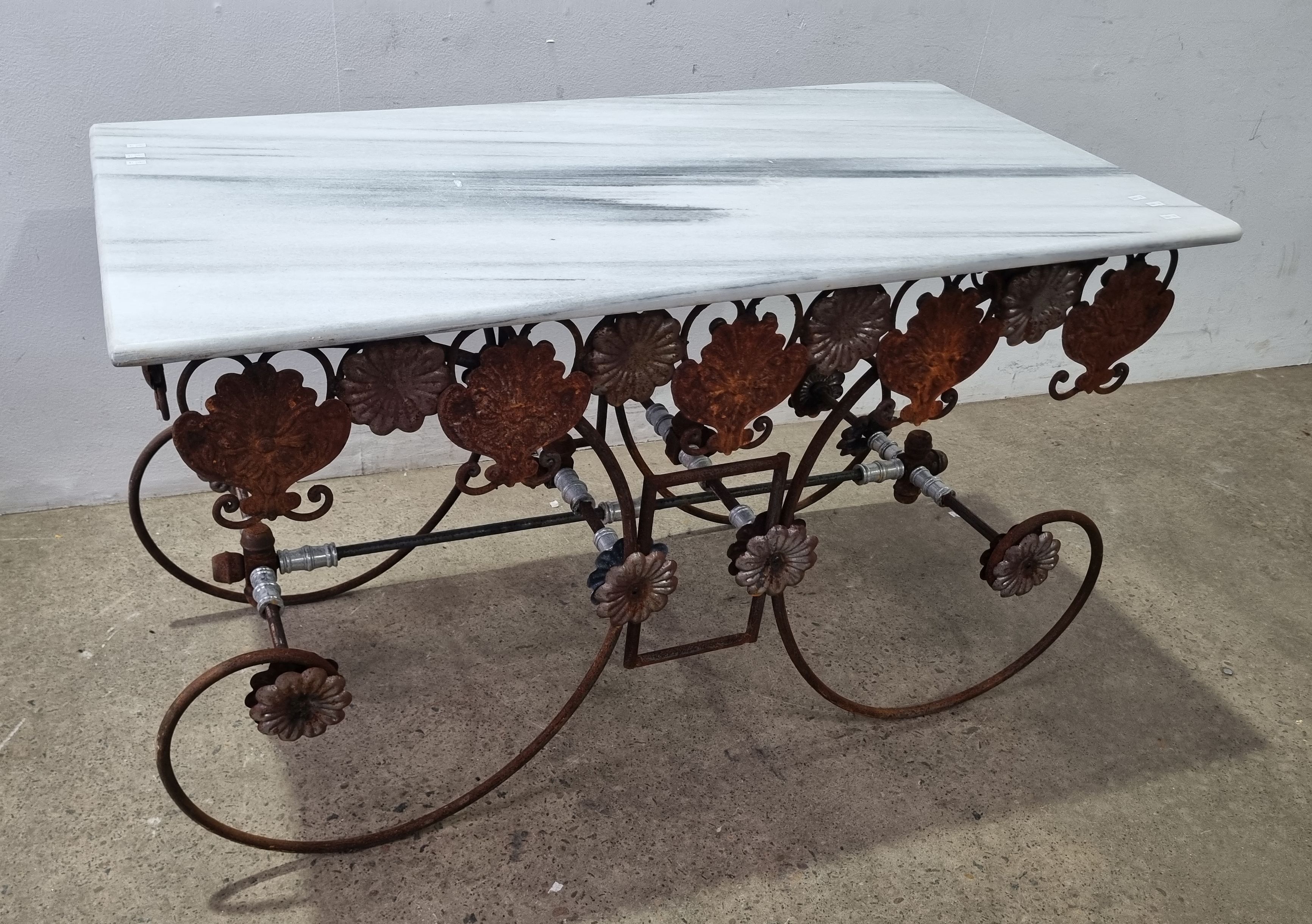 2027 · A MARBLE TOP TABLE