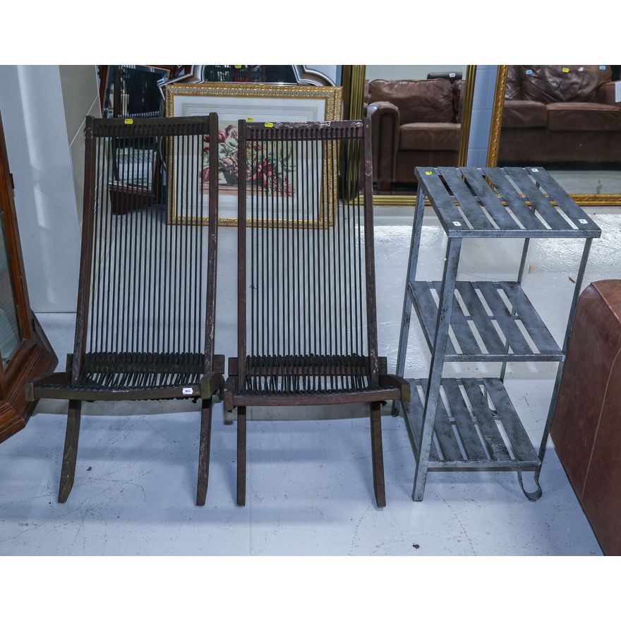 A Metal Shelving Unit & a Pair of Folding Chairs