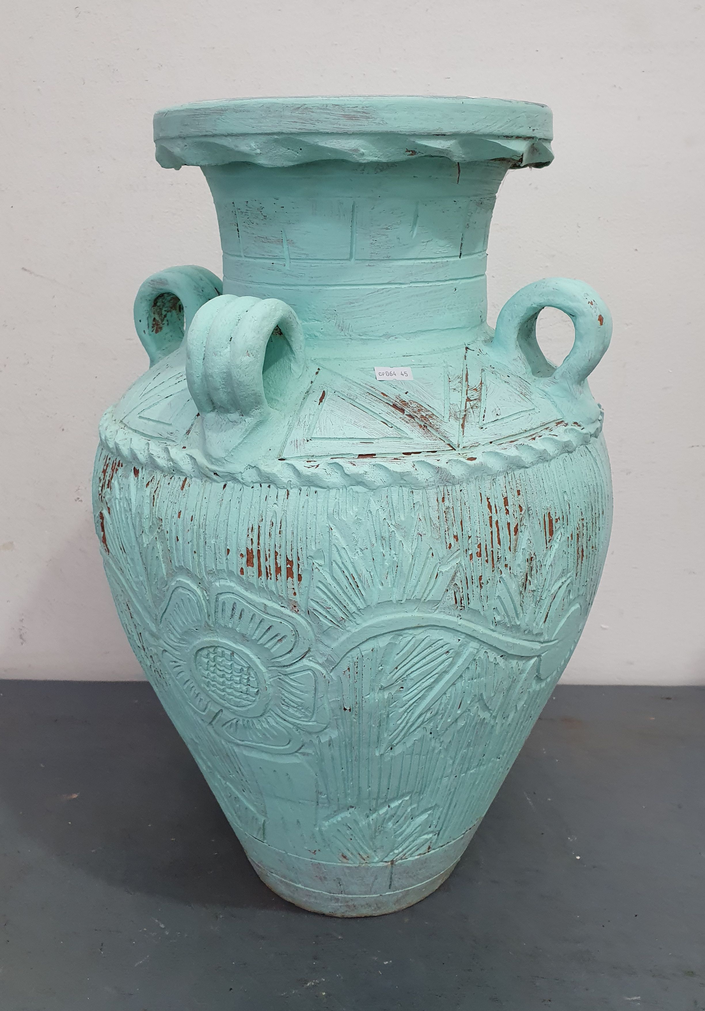 A Terracotta Painted Churn