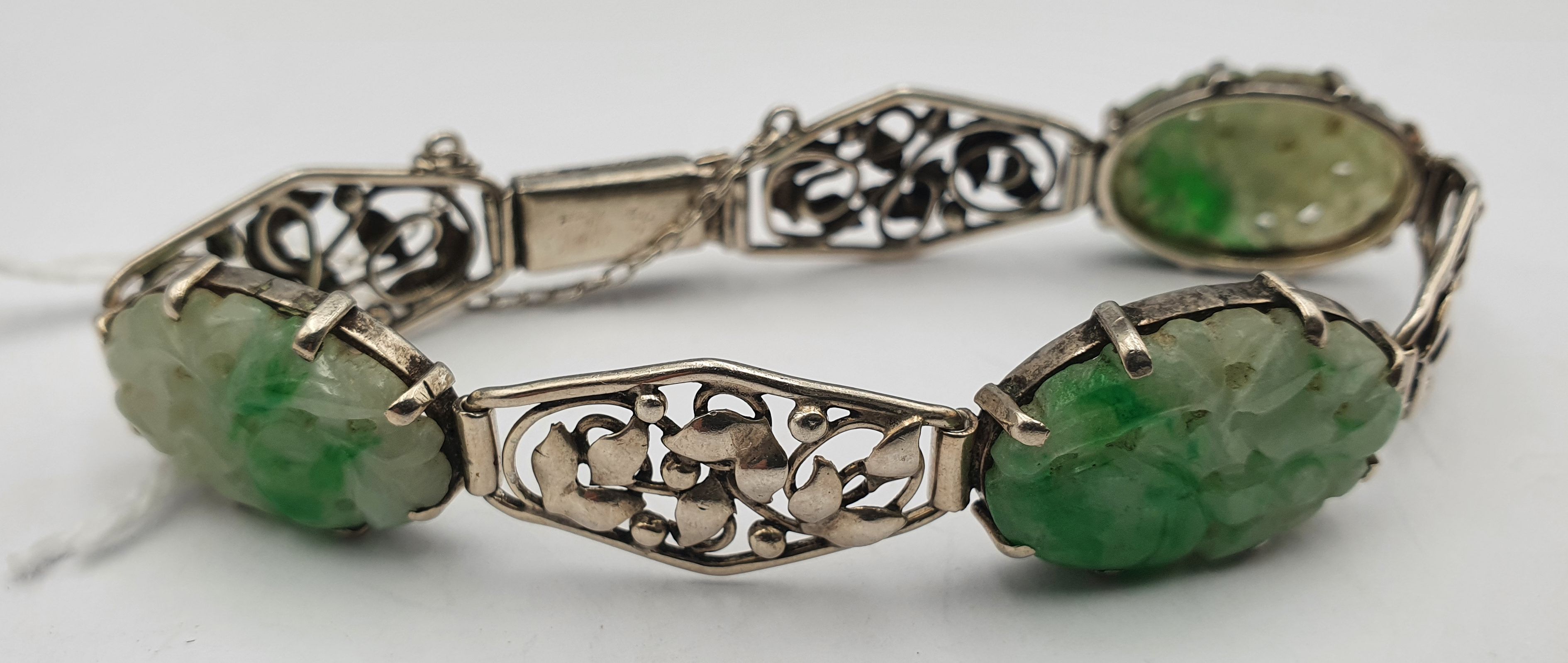 An Antique Silver And Jade Bracelet