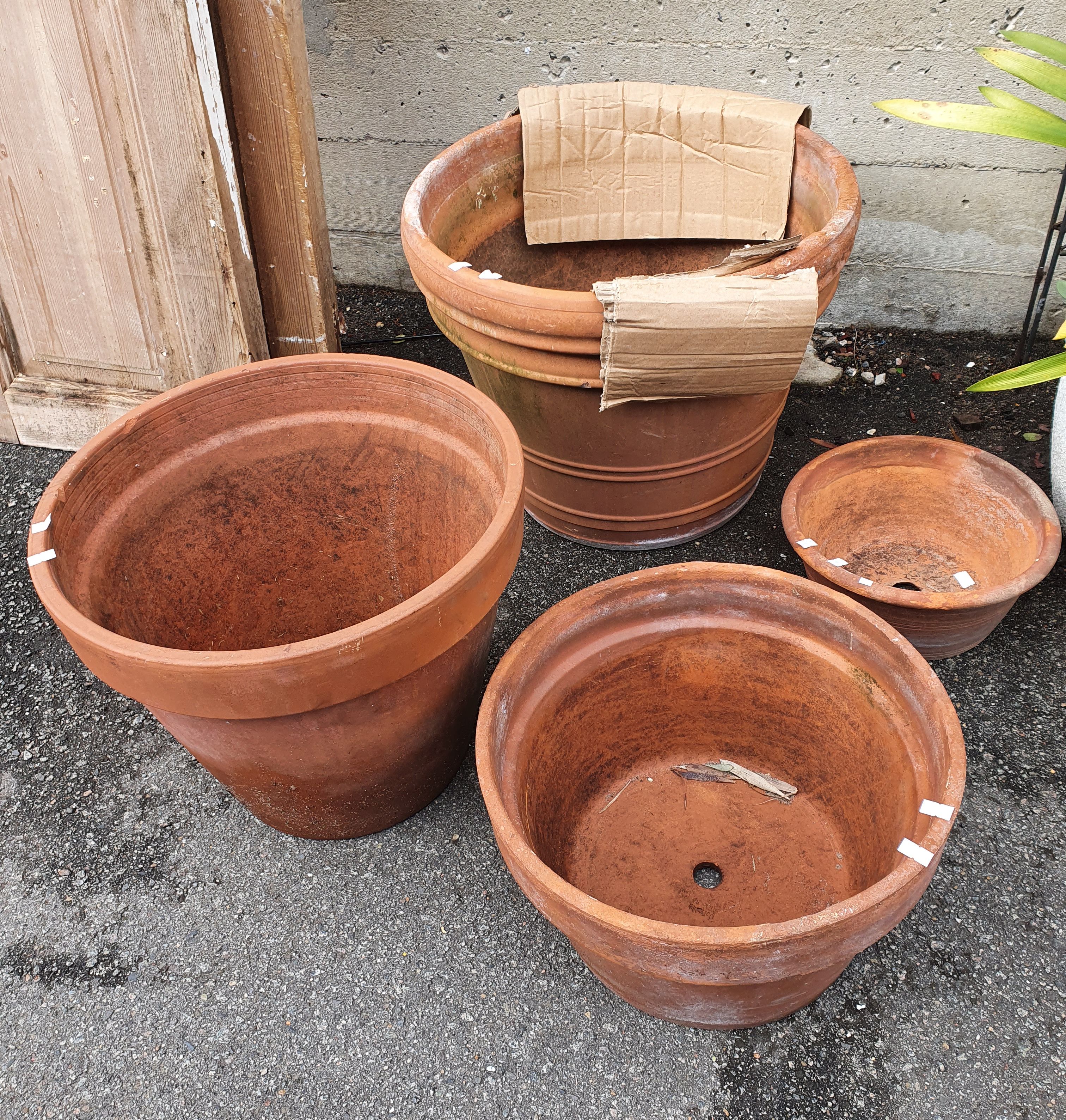 1124 · FOUR VARIOUS TERRACOTTA POTS