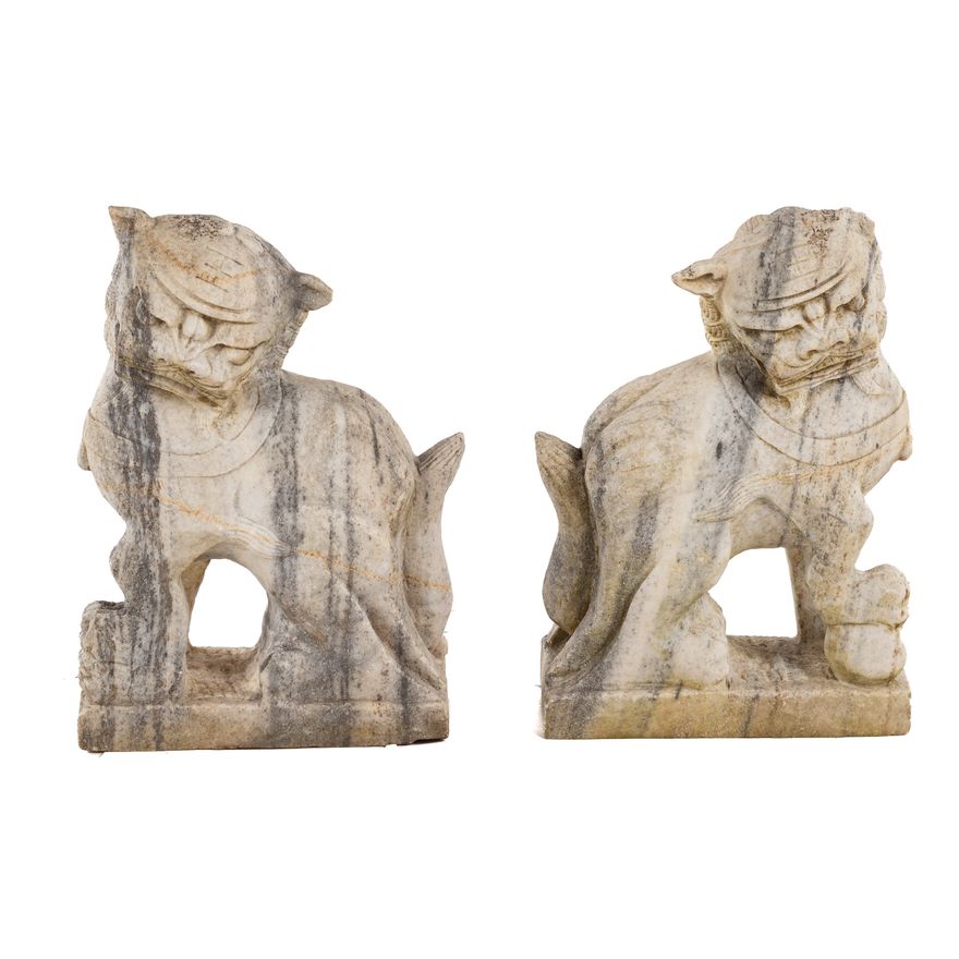 A Pair of Carved Marble Foo Dogs