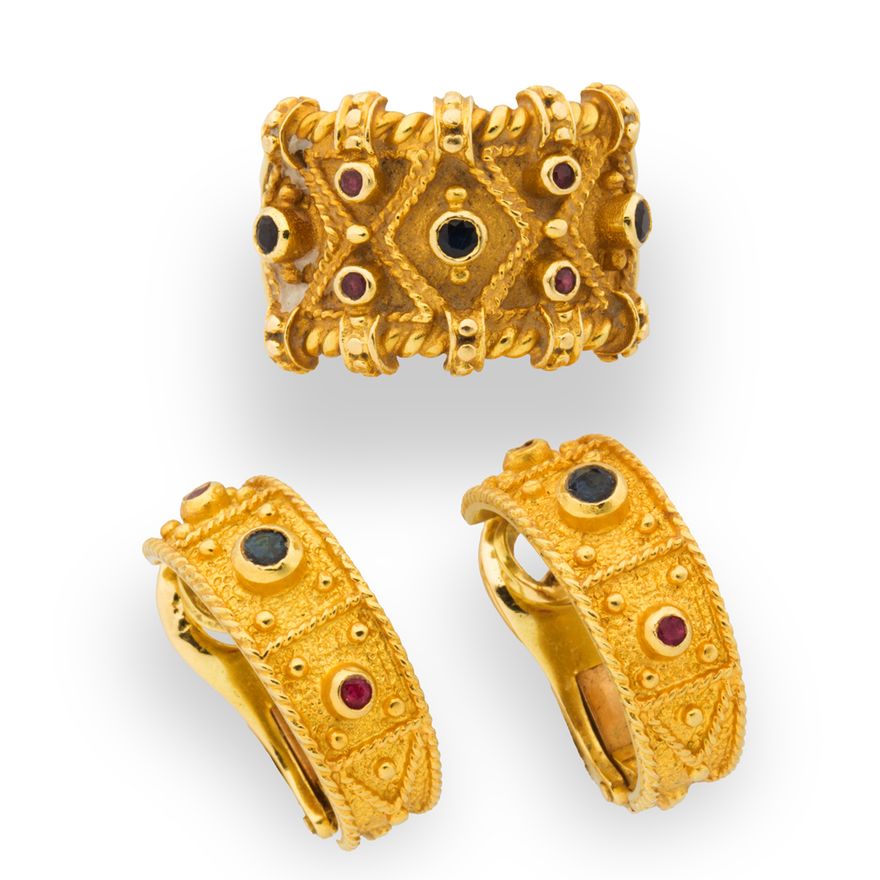 A pair of gemstone and eighteen karat gold earrings and ring suite
