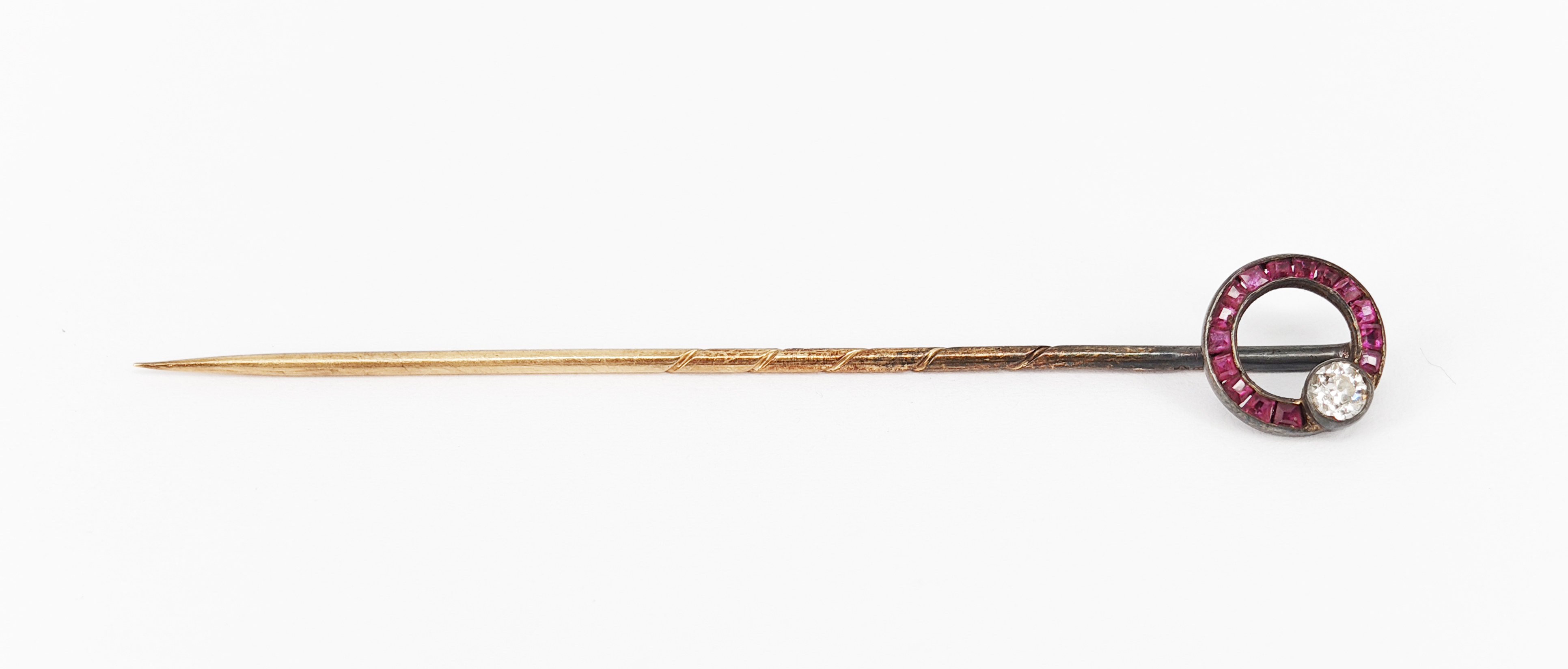 9 · A ROSE GOLD RUBY AND DIAMOND HAT PIN