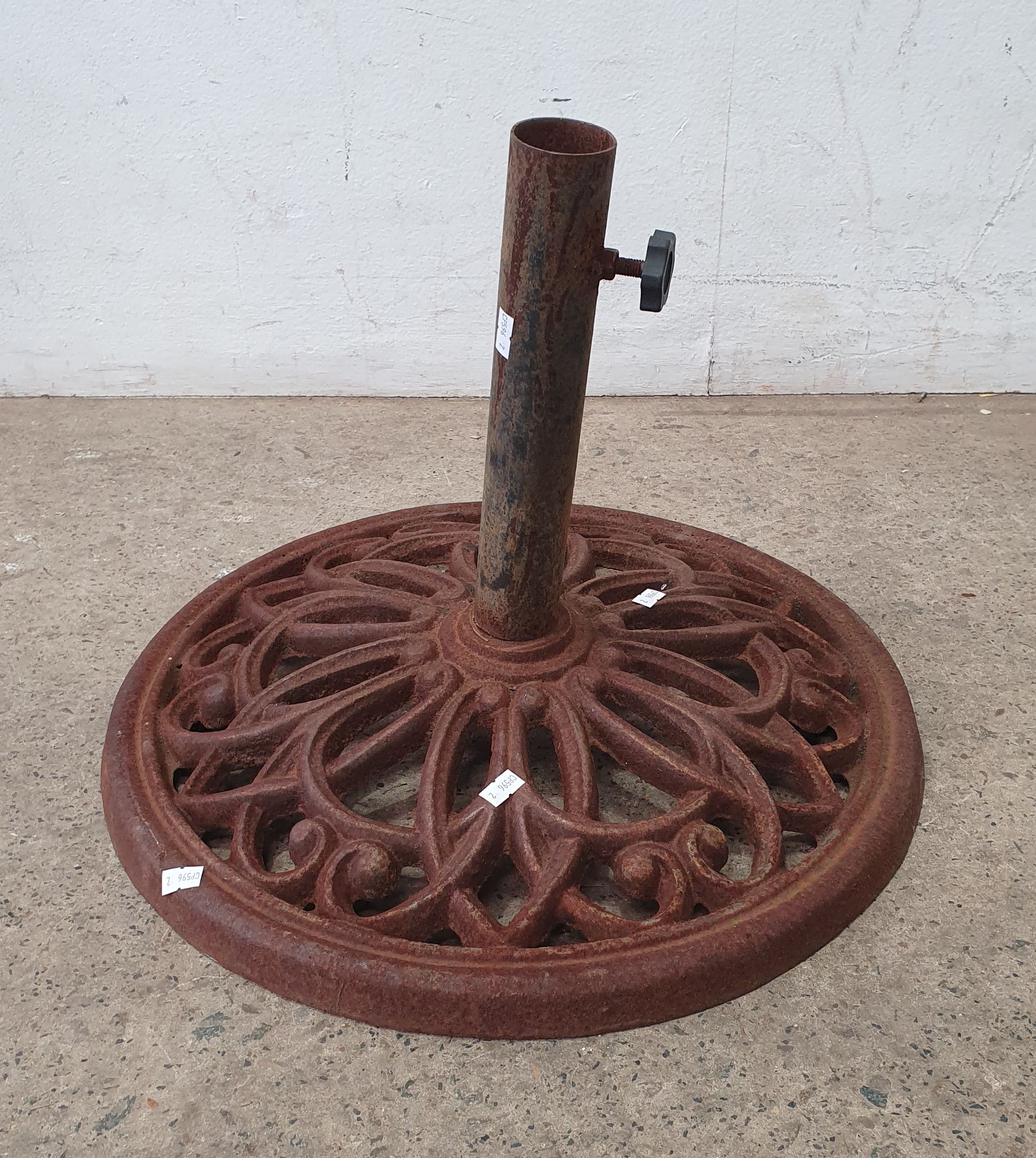 1059 · A CAST IRON UMBRELLA STAND