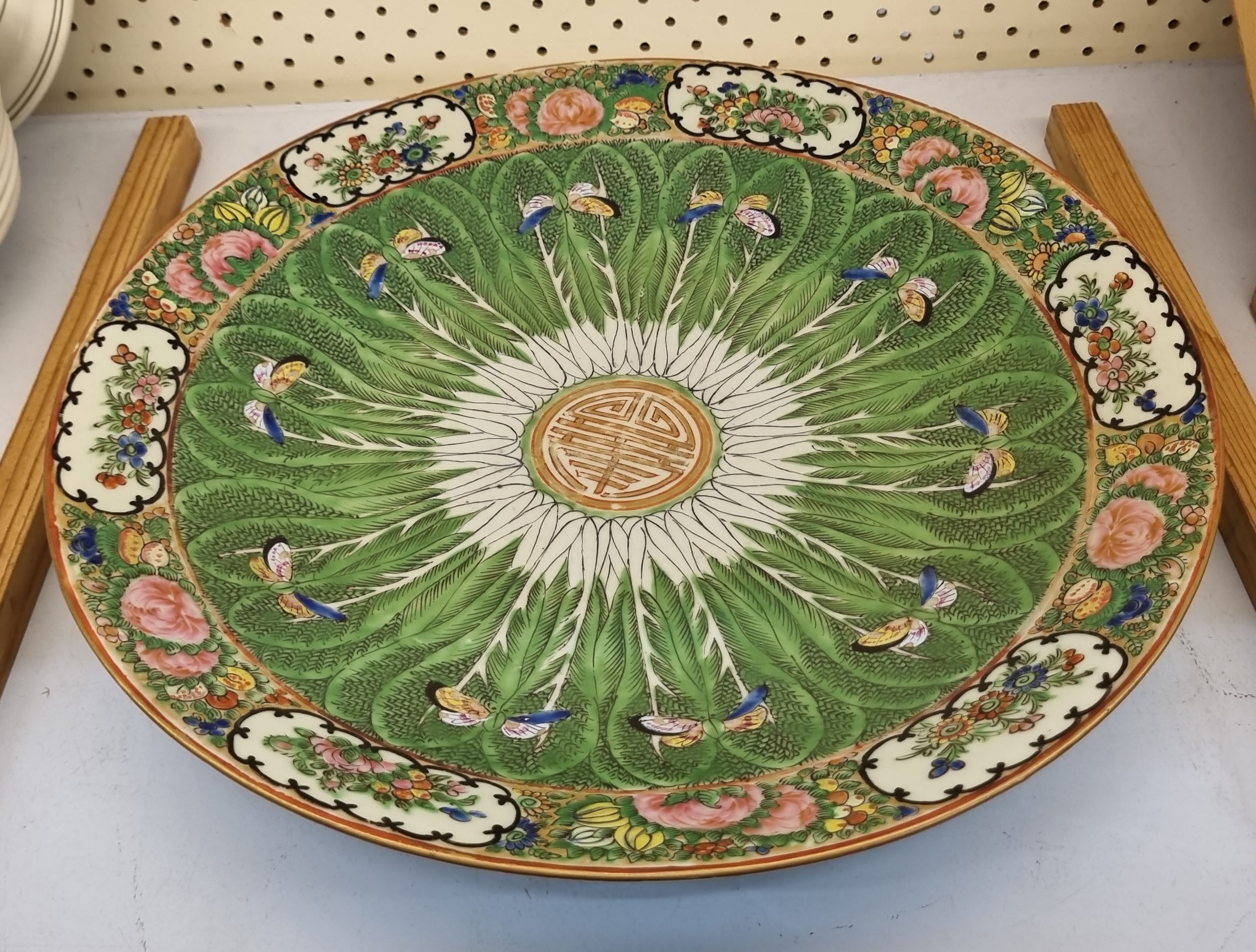 50 · A CHINESE POLYCHROME CHARGER WITH BUTTERFLY MOTIF