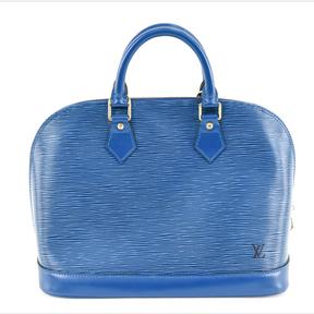 Luxe Louis Vuitton luggage packs a punch at auction