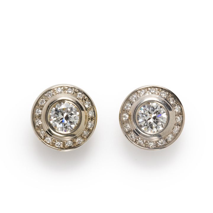 A pair of diamond and eighteen karat gold earrinngs