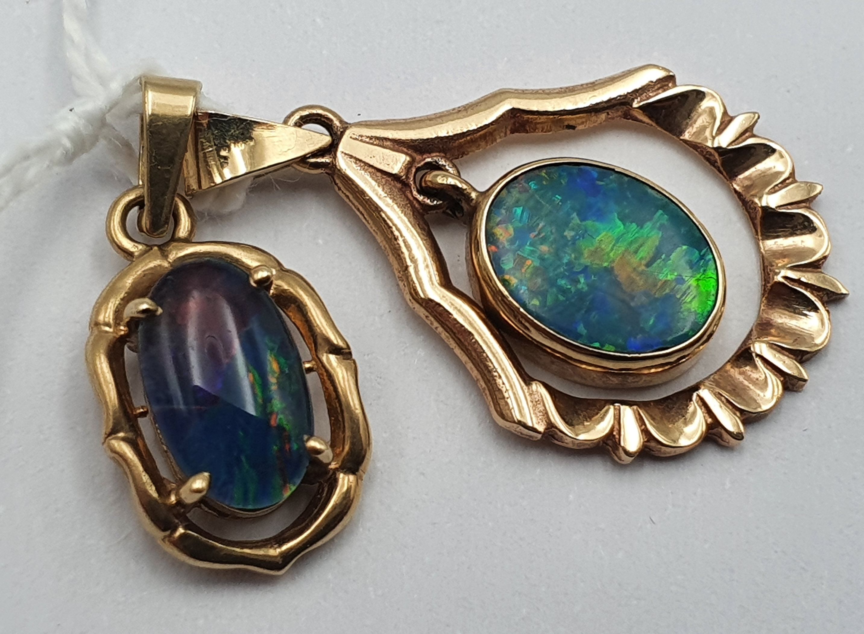 291 · TWO 9ct GOLD AND OPAL PENDANTS