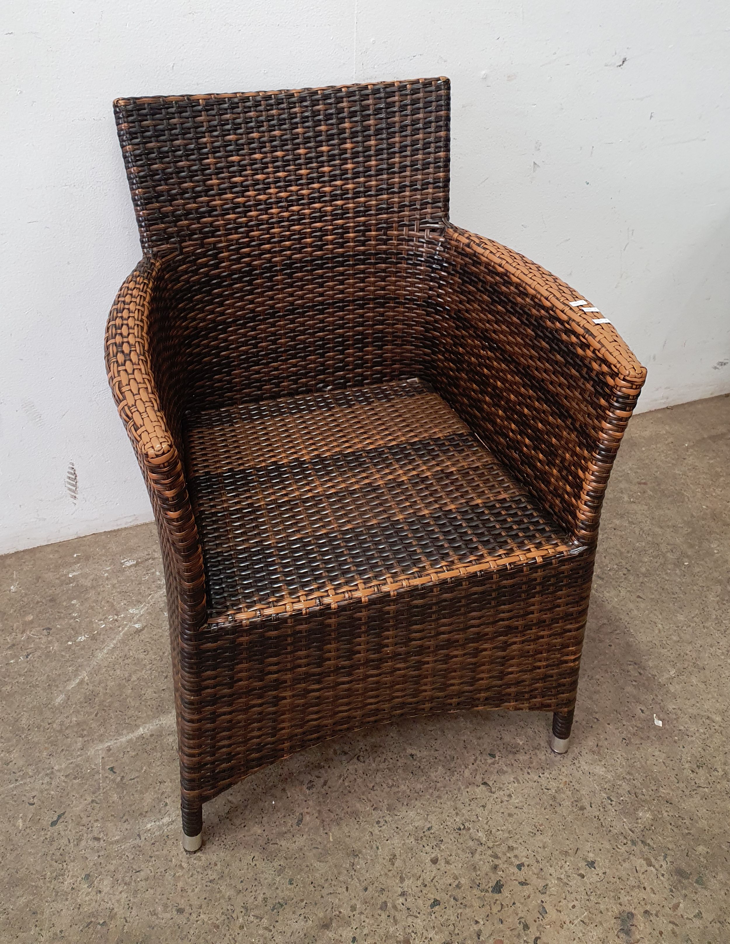 1027 · A CANE OUTDOOR CHAIR