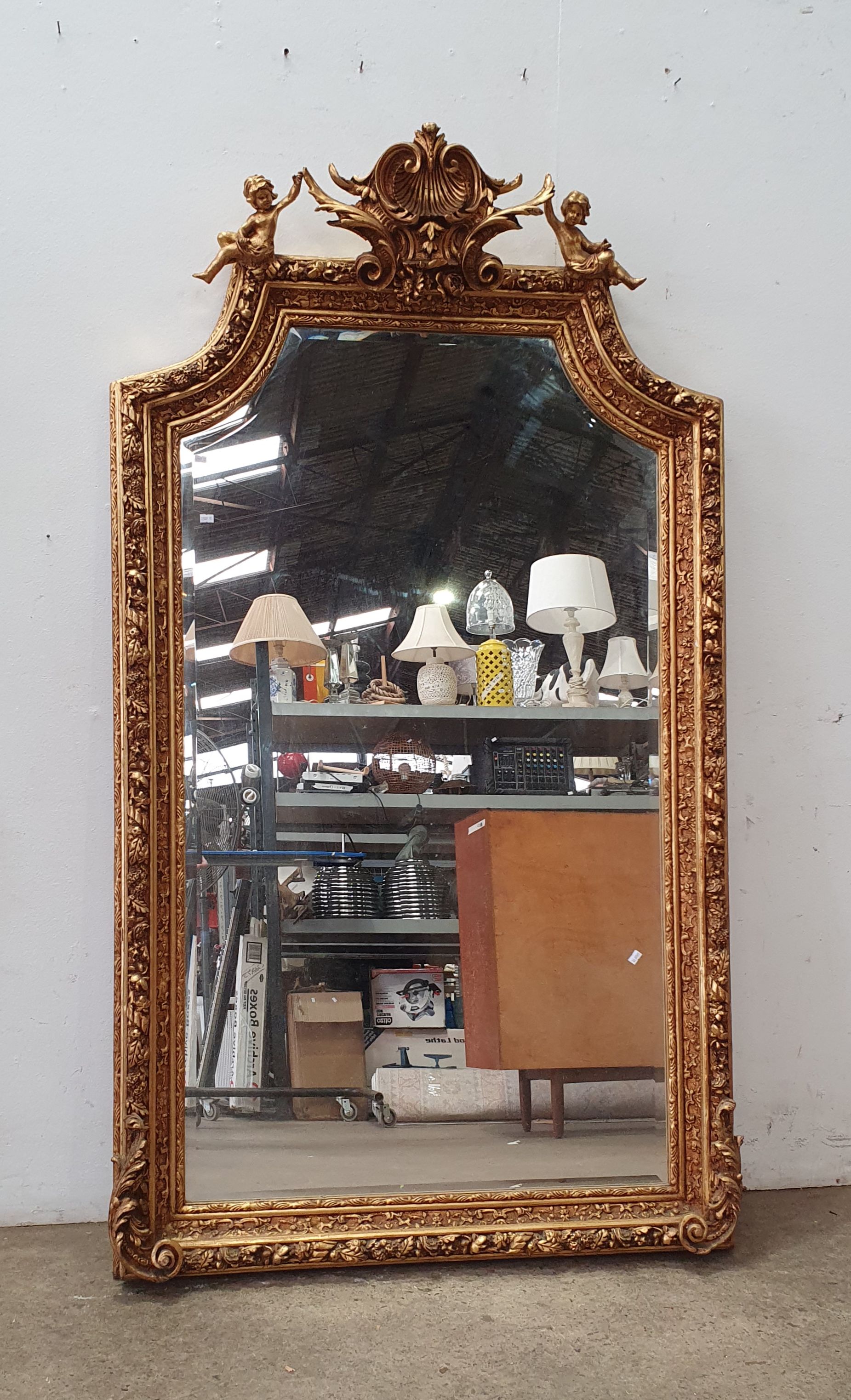 A Gilt Framed Entranced Mirror