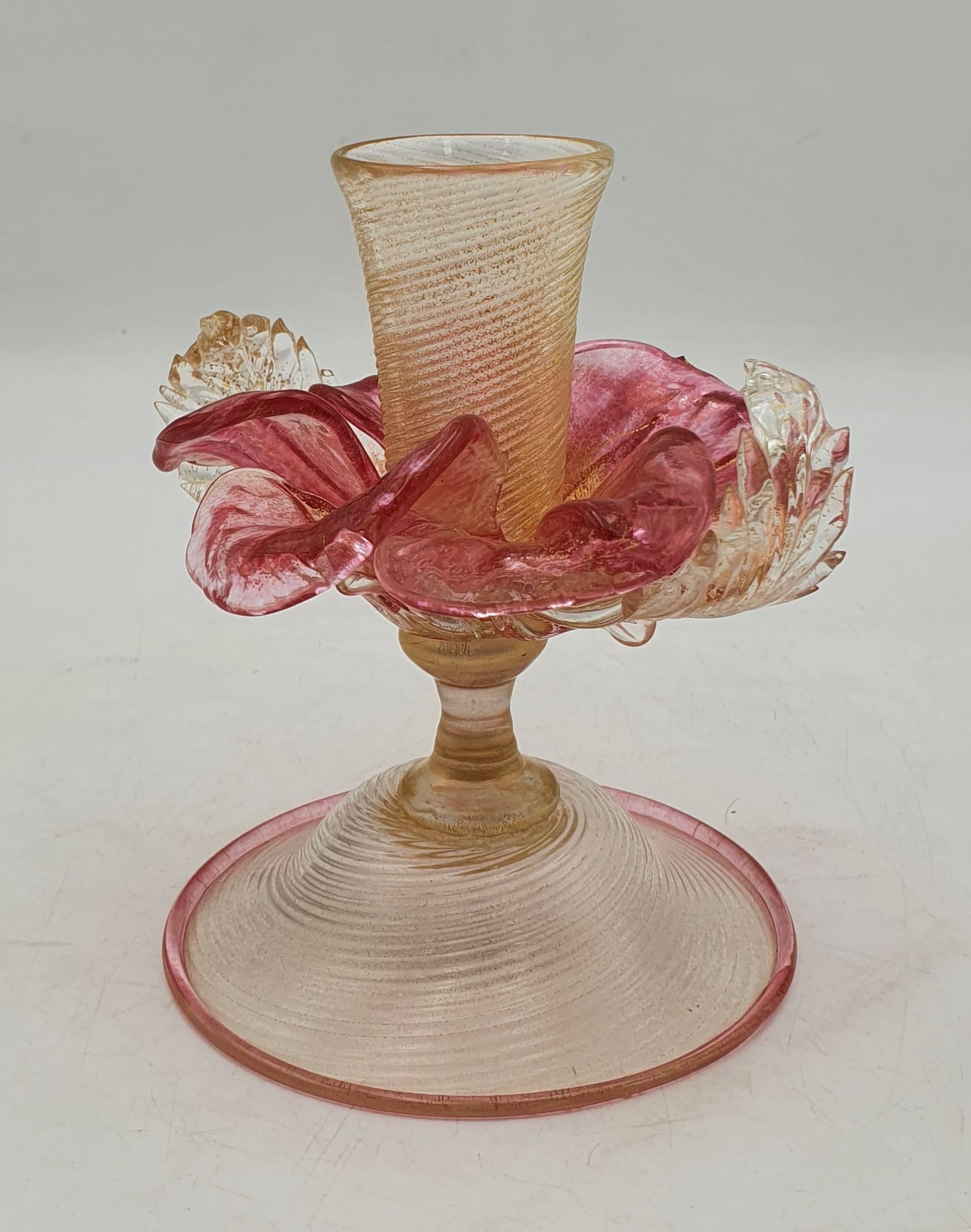 A MURANO FLOWER FORM GLASS CANDLE HOLDER