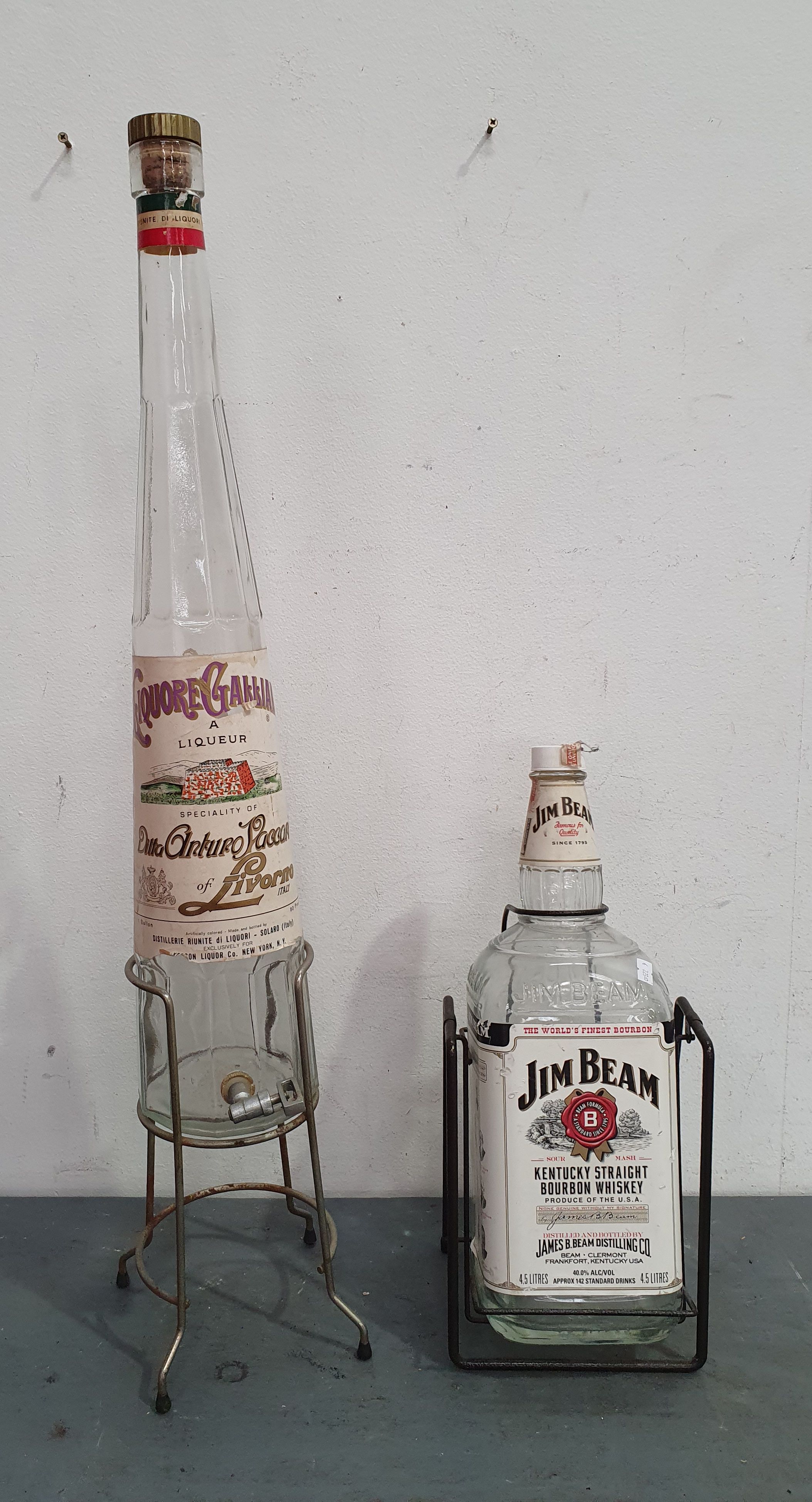 A PAIR OF LARGE ALCOHOL BOTTLES
