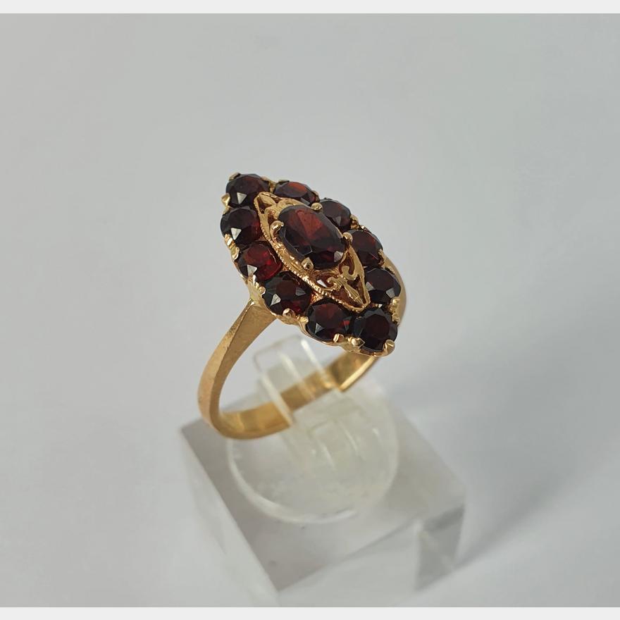 A 14ct ROSE GOLD AND GARNET MARQUISE CLUSTER RING | Raffan Kelaher ...