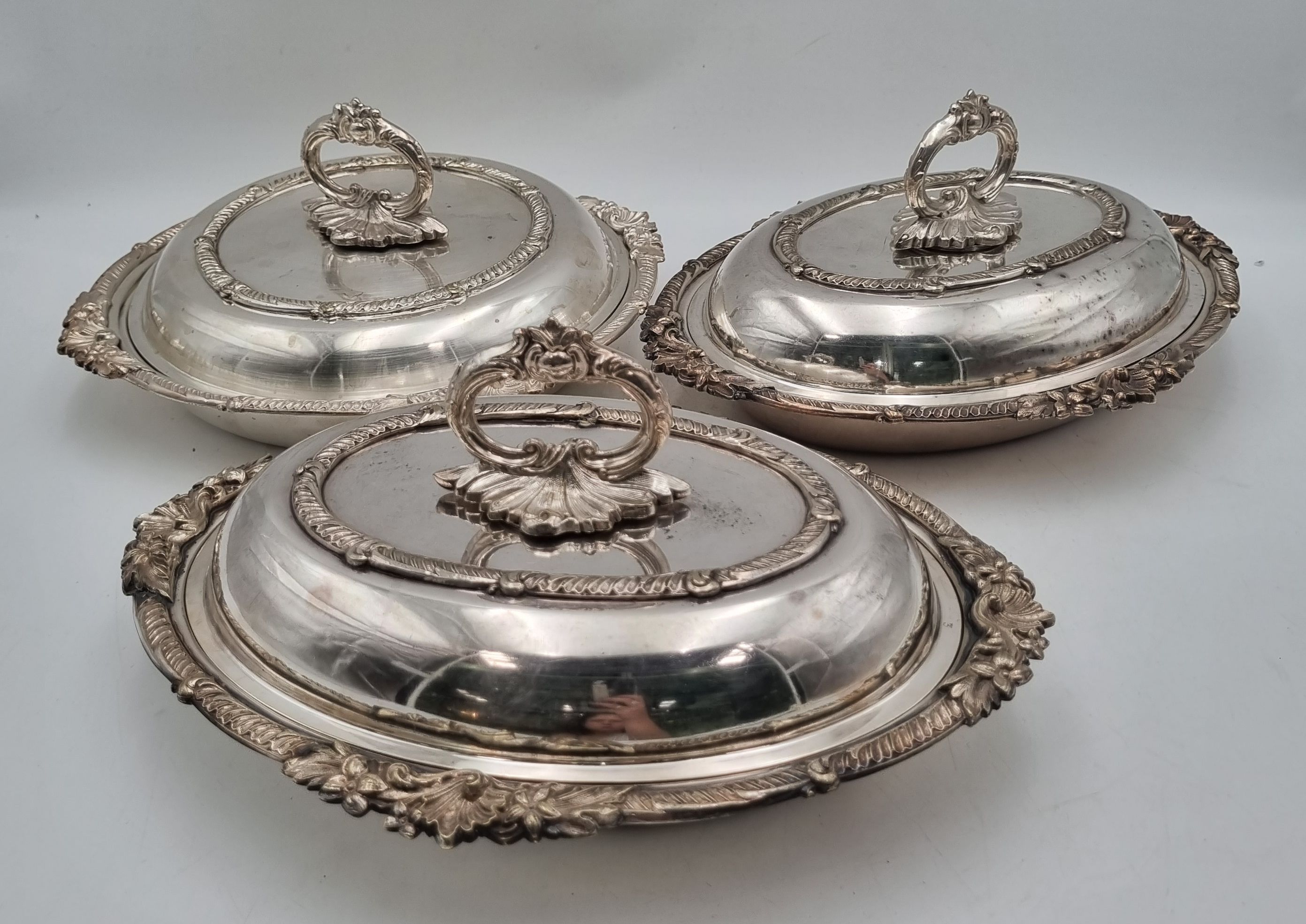 A Matched Set Of Three Silver Plated Entree Dishes