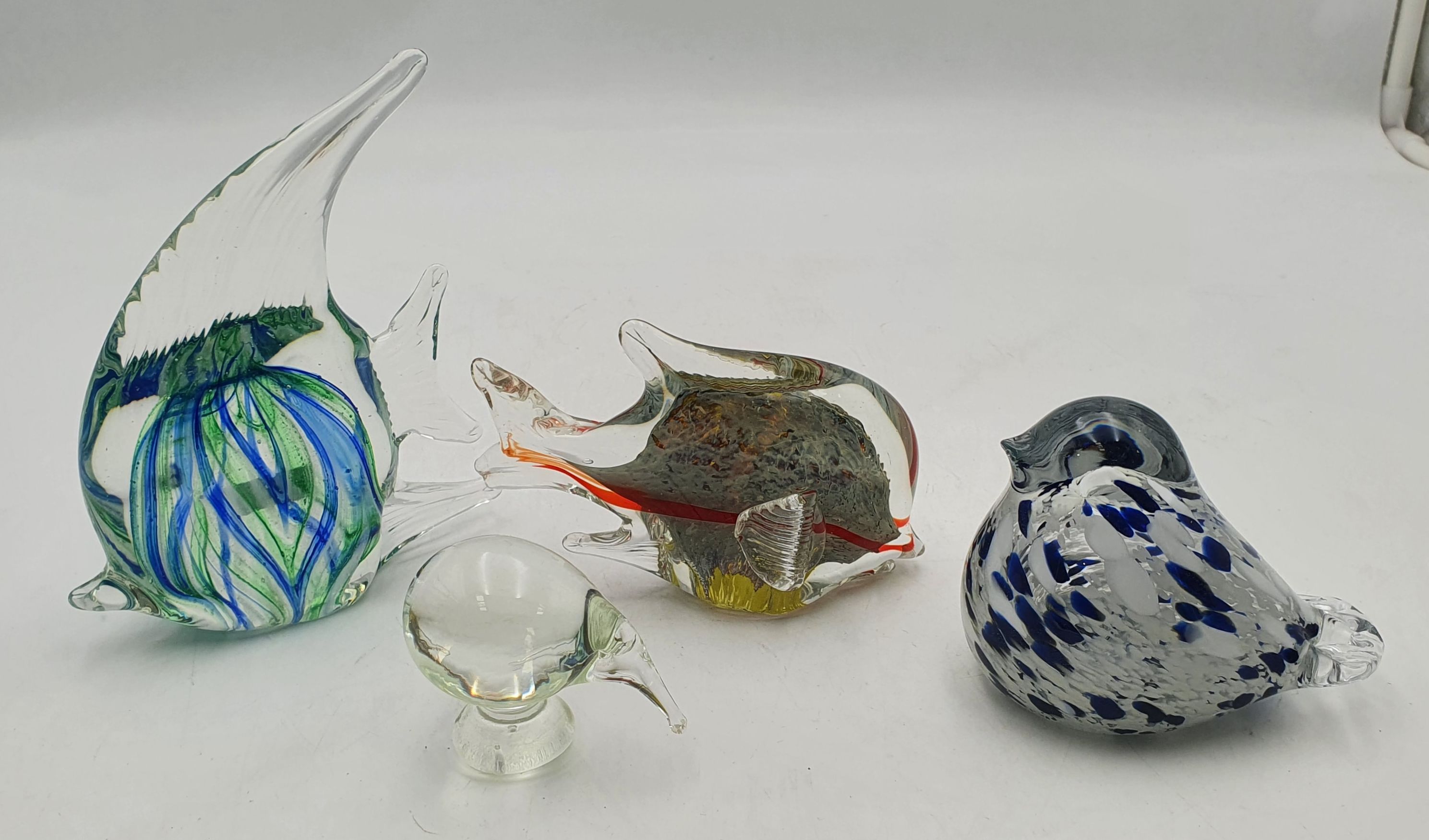 554 · FOUR VARIOUS ART GLASS PAPERWEIGHTS