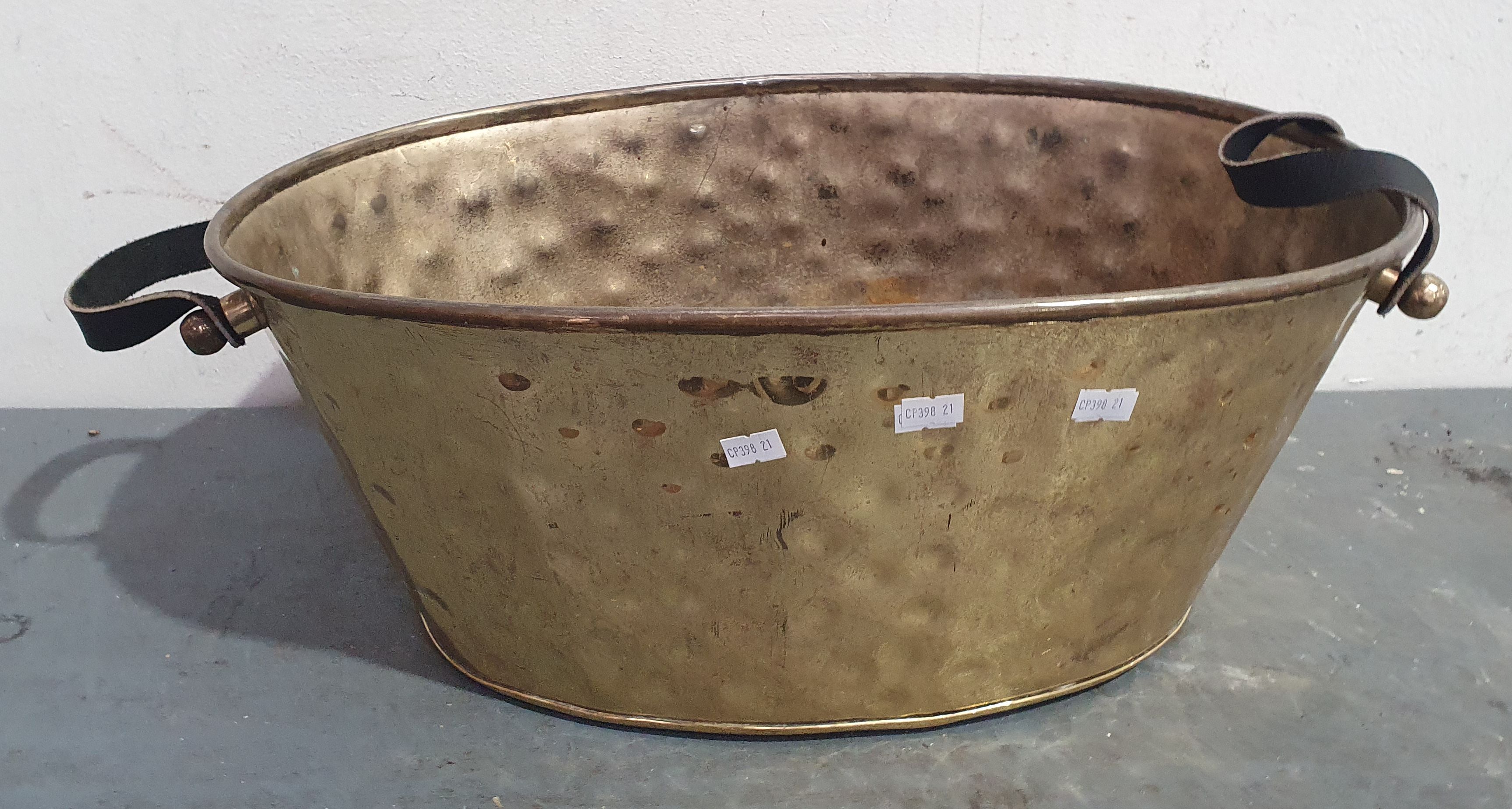 1002 · A BRASS CONTAINER