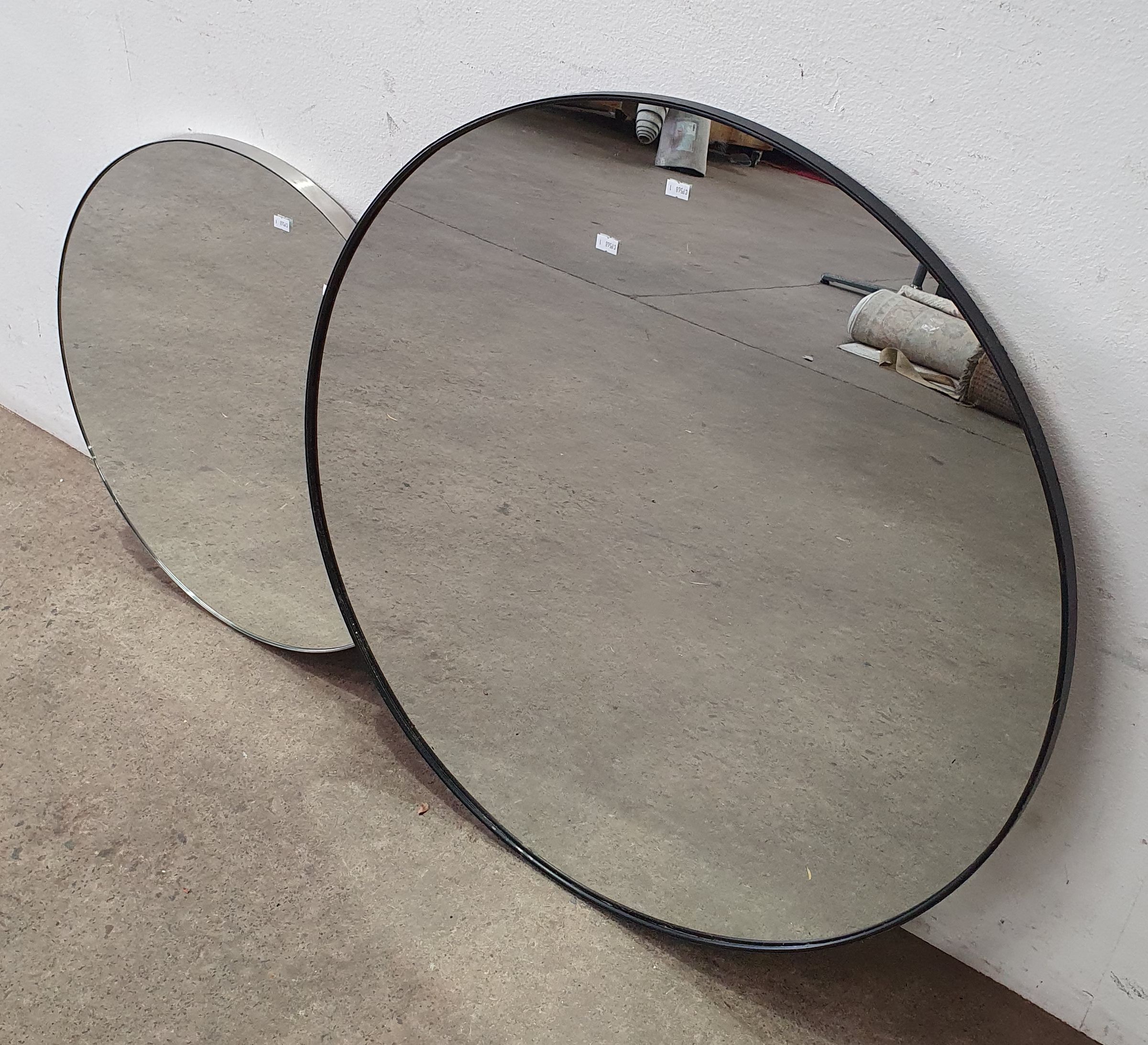 Two Round Wall Mirrors