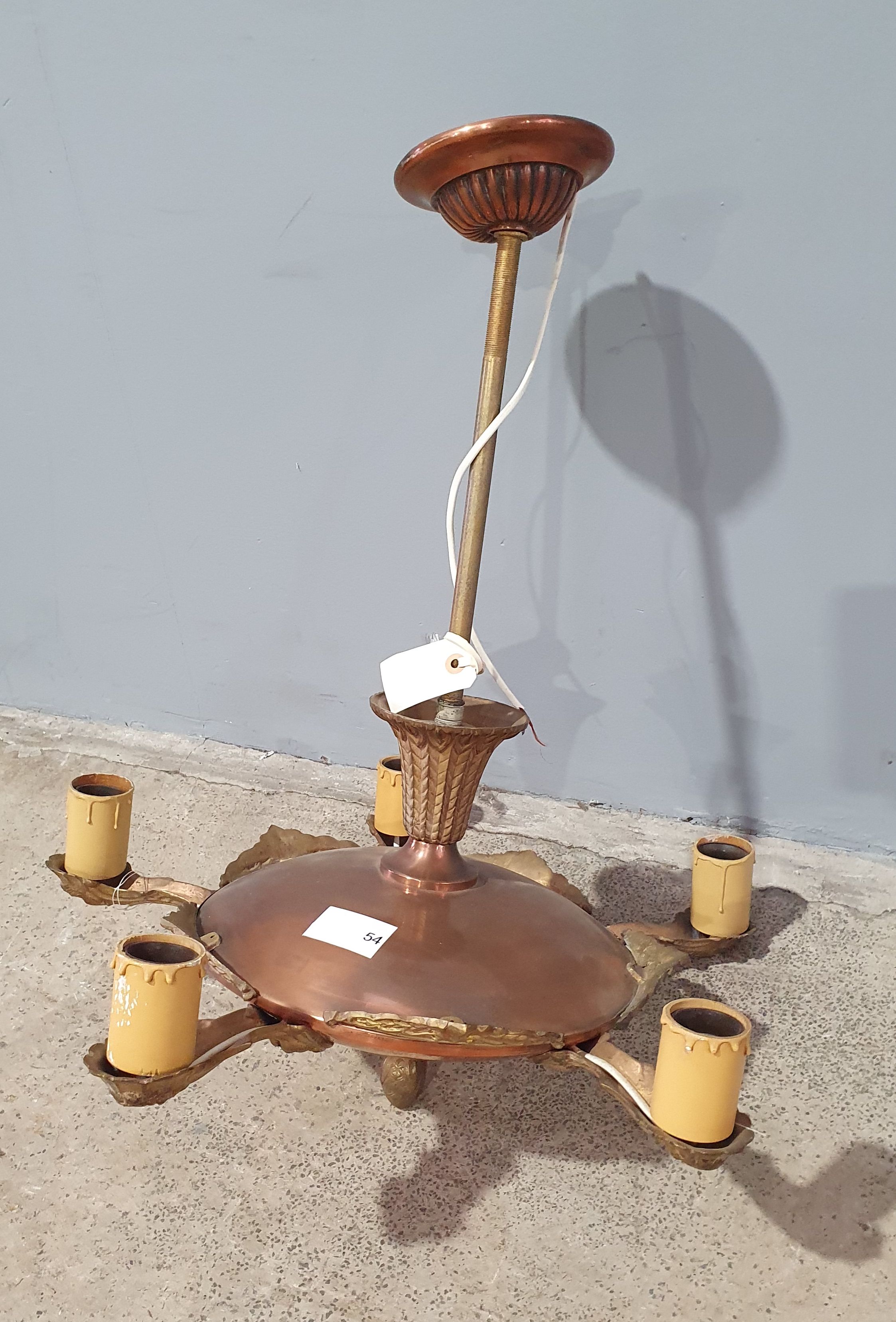 A COPPER CEILING LIGHT
