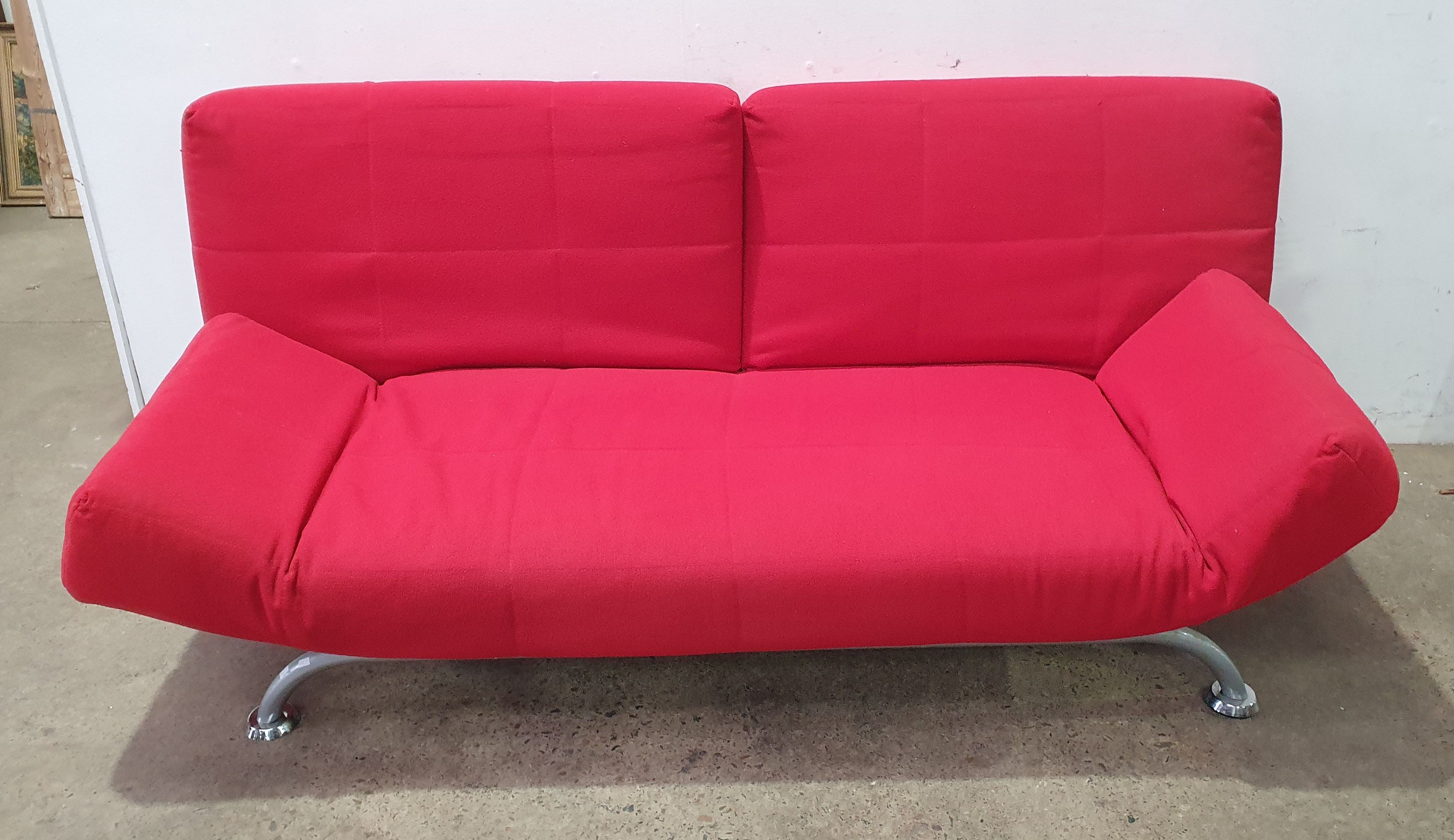 A Two Seater Red Settee