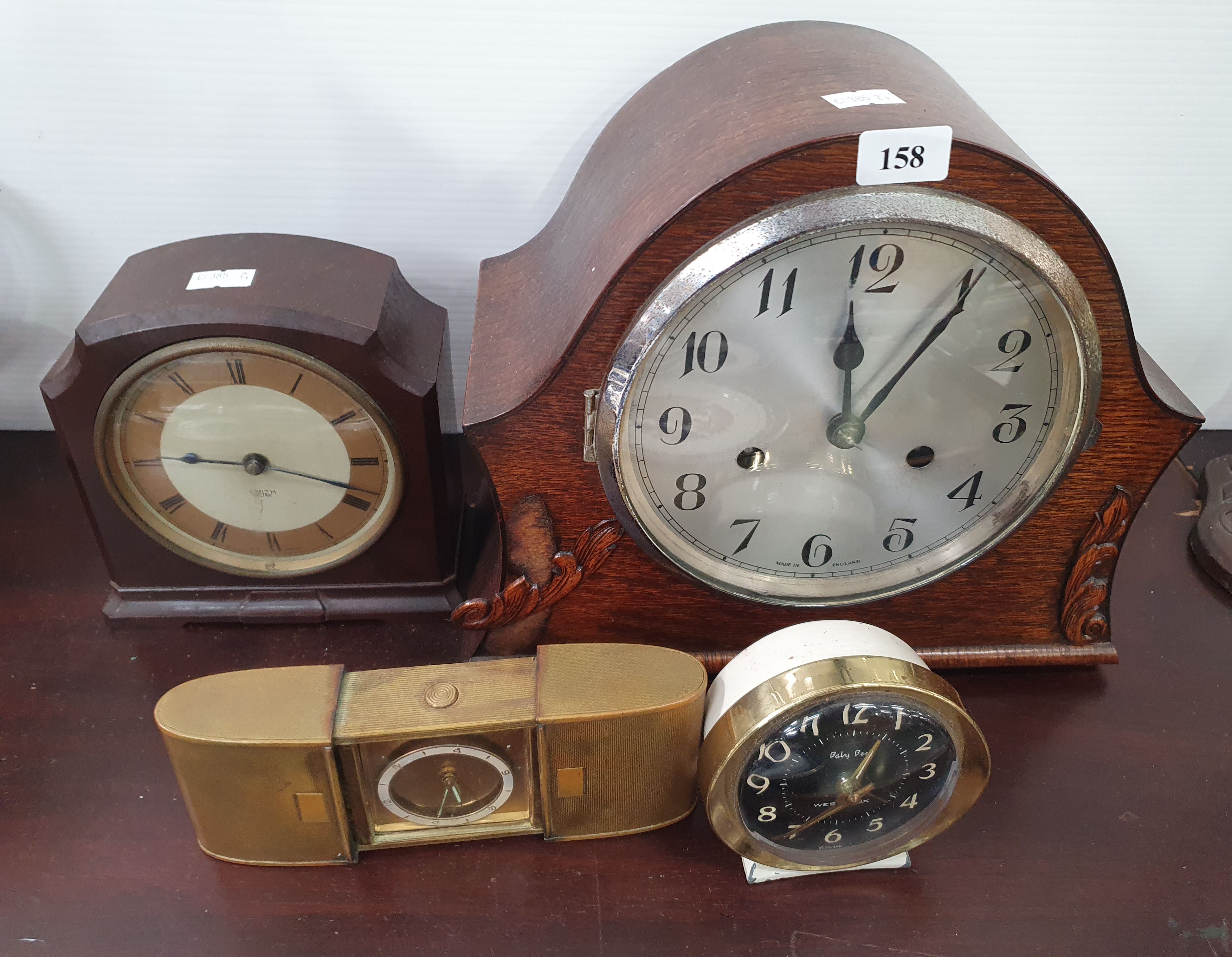 158 · FOUR VARIOUS CLOCKS