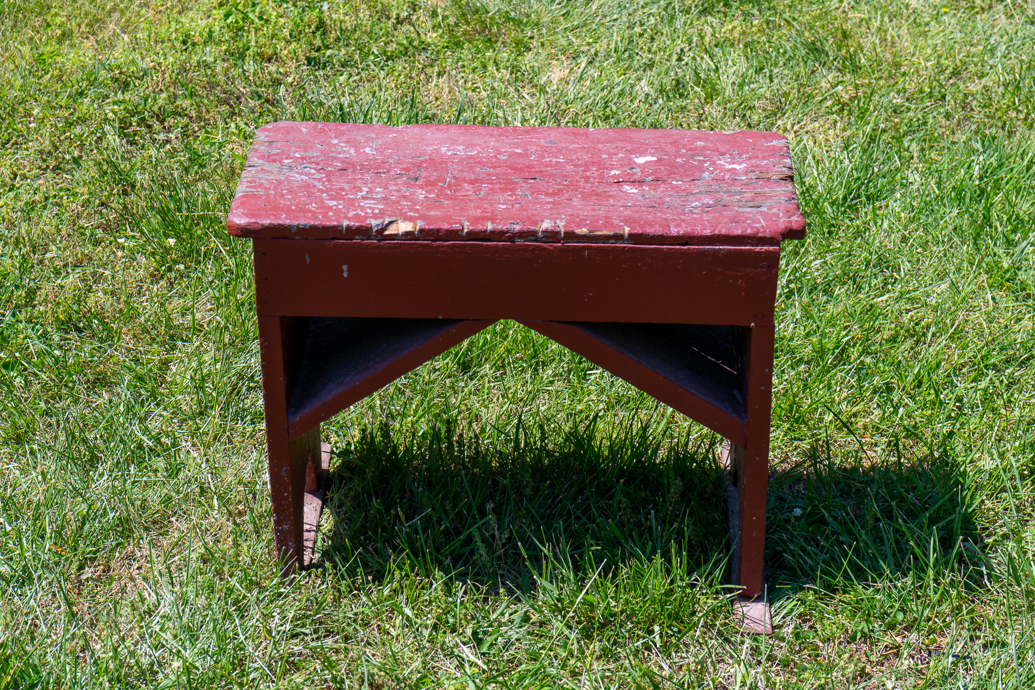Primitive Wooden Red Painted Stool | Harritt Group, Inc
