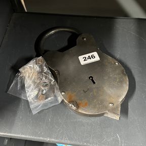 An interesting hand made steel padlock, H. 25cm.