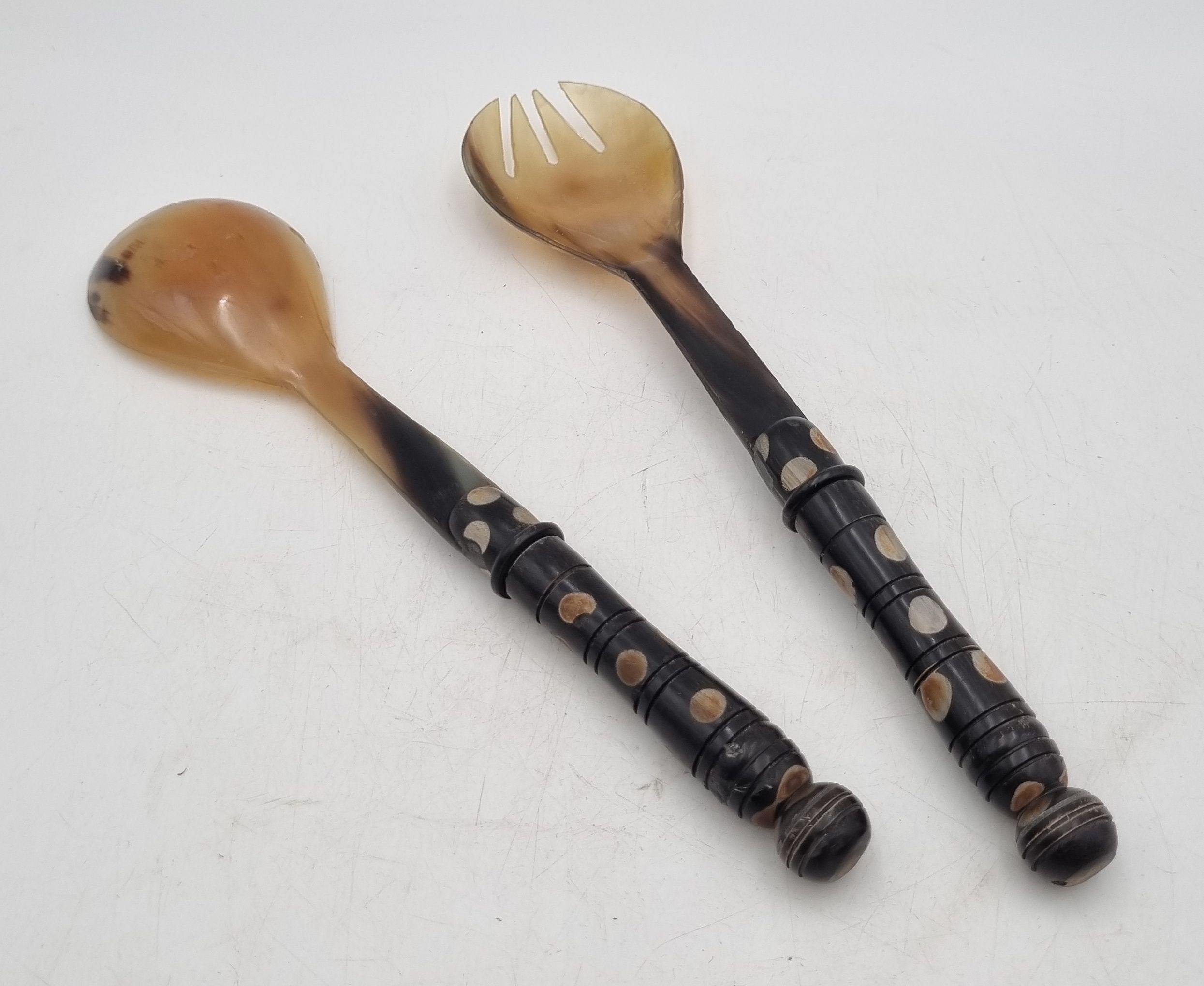 A PAIR OF VINTAGE HORN SALAD SERVERS