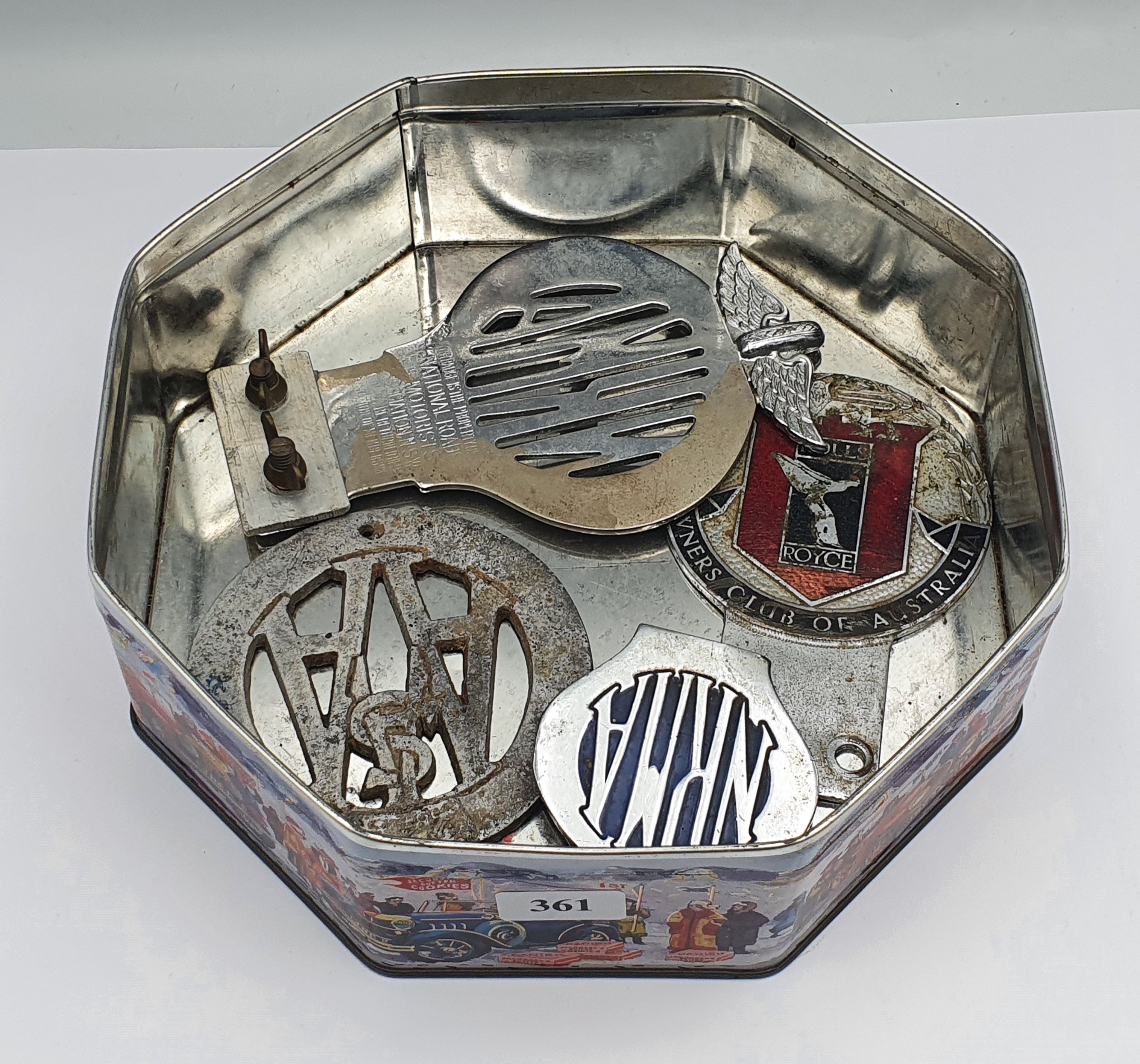 361 · FOUR CAR BADGES