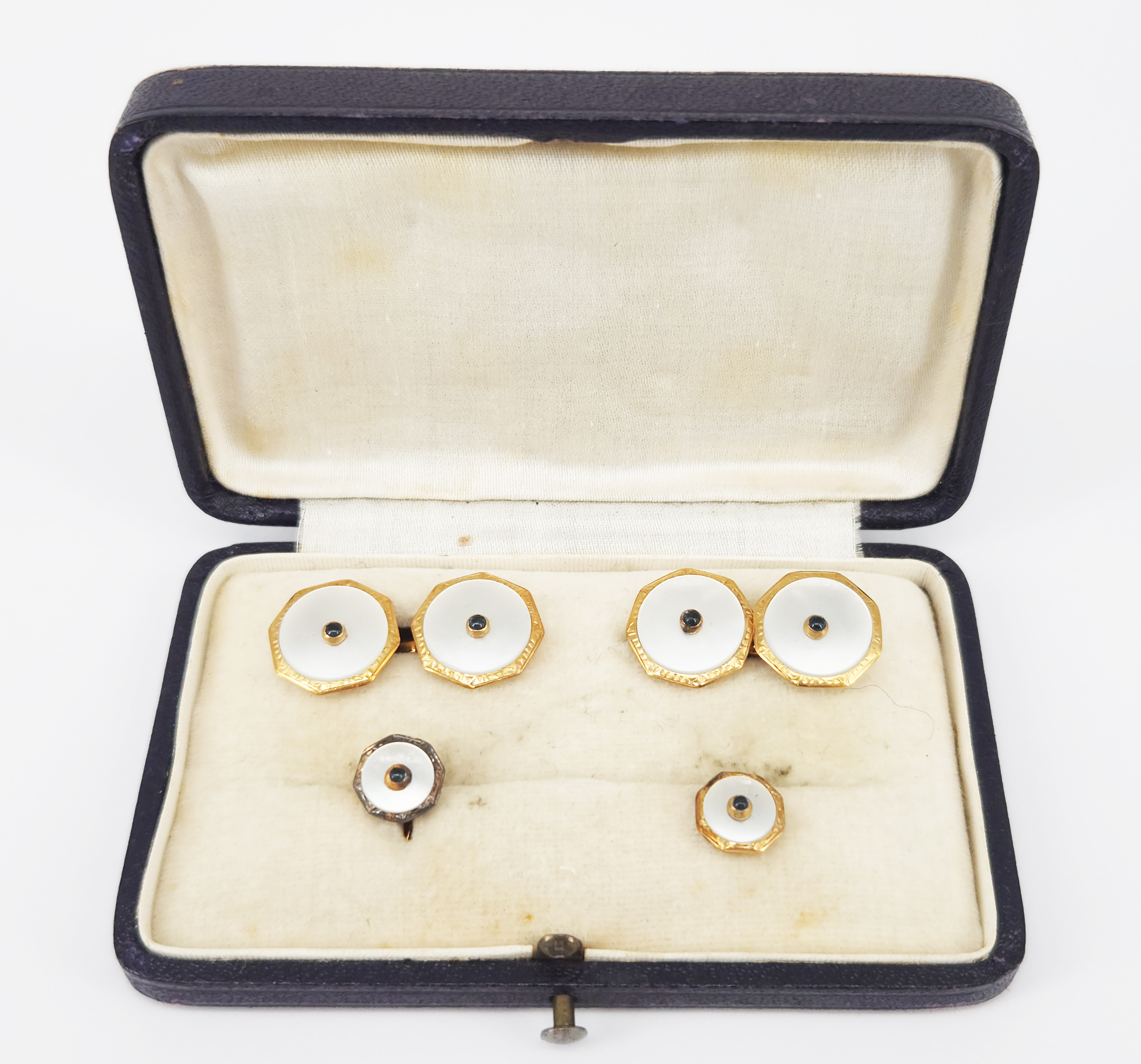 A Pair Of Gold And Mother-Of-Pearl Cufflinks