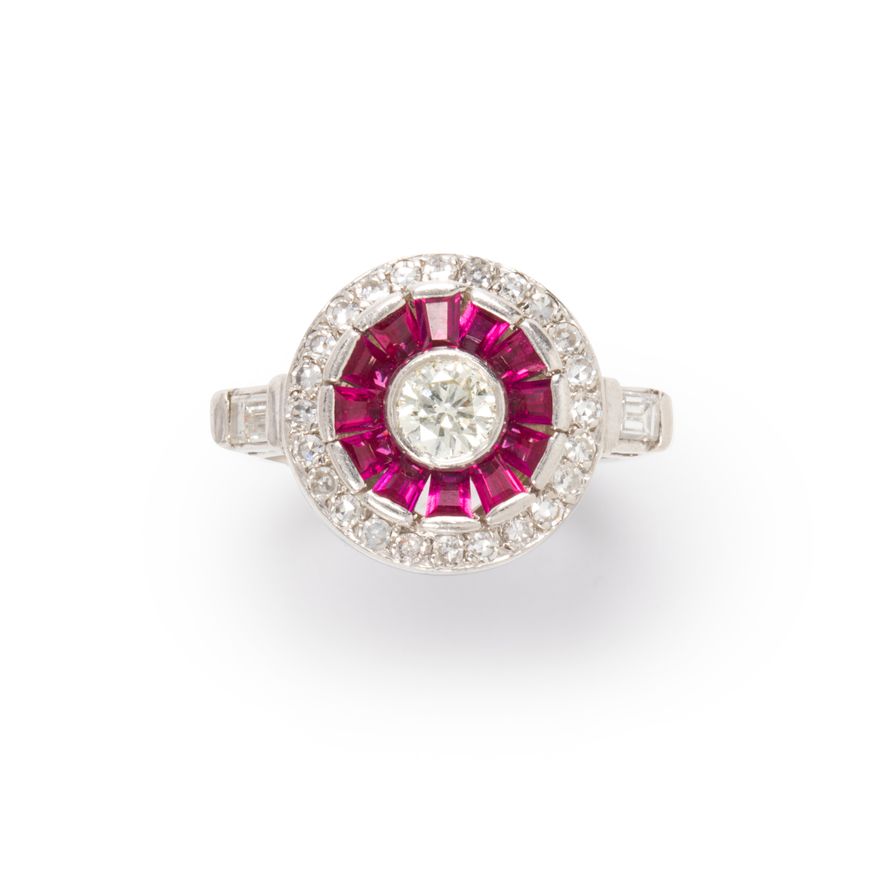 A diamond, ruby and platinum ring