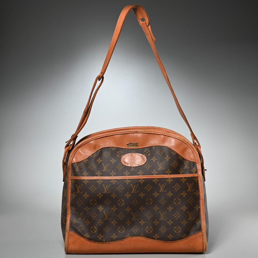 Lot - Vintage Louis Vuitton The French Company circa 1970 monogrammed travel  bag.