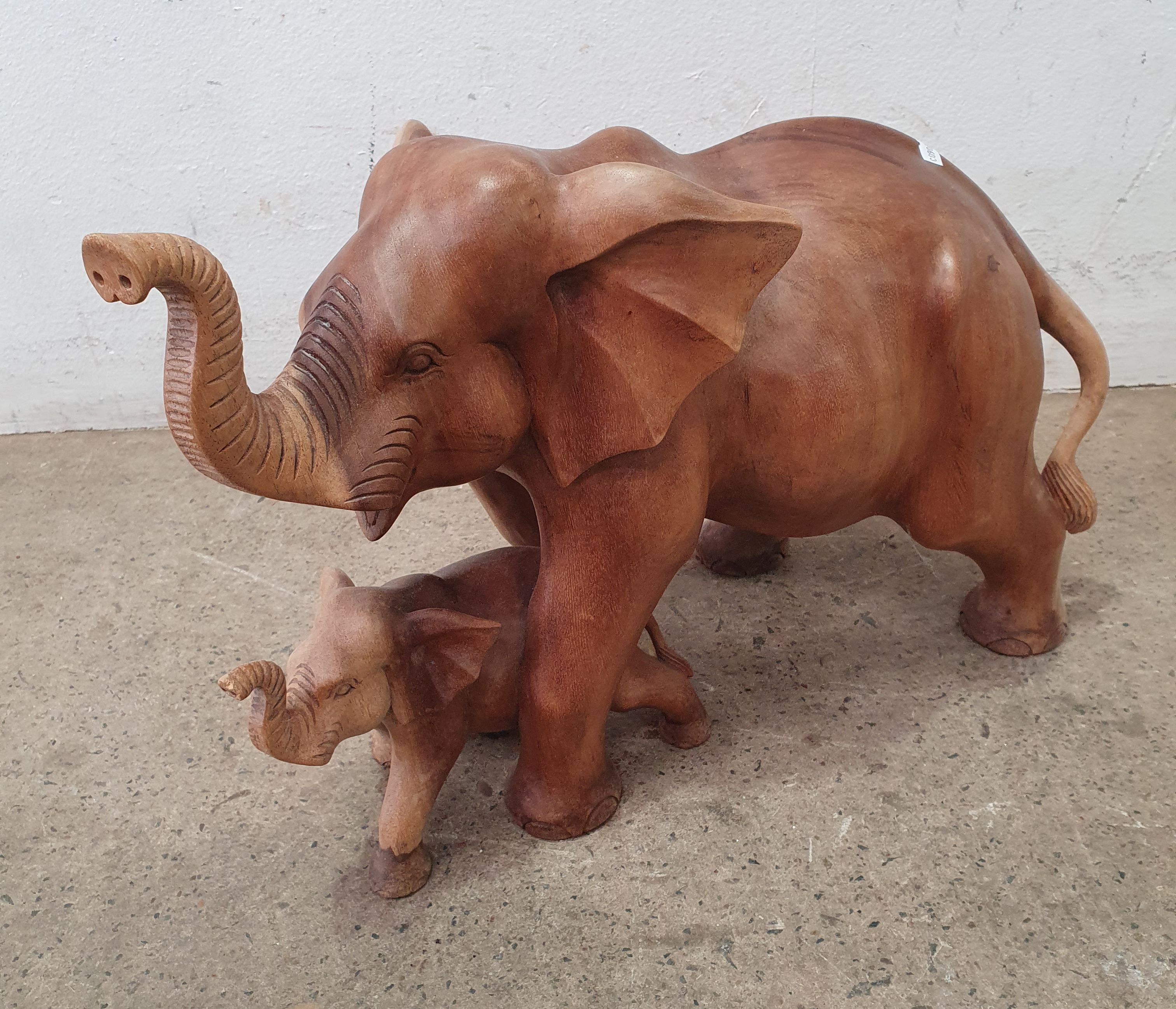 A TIMBER CARVED ELEPHANT