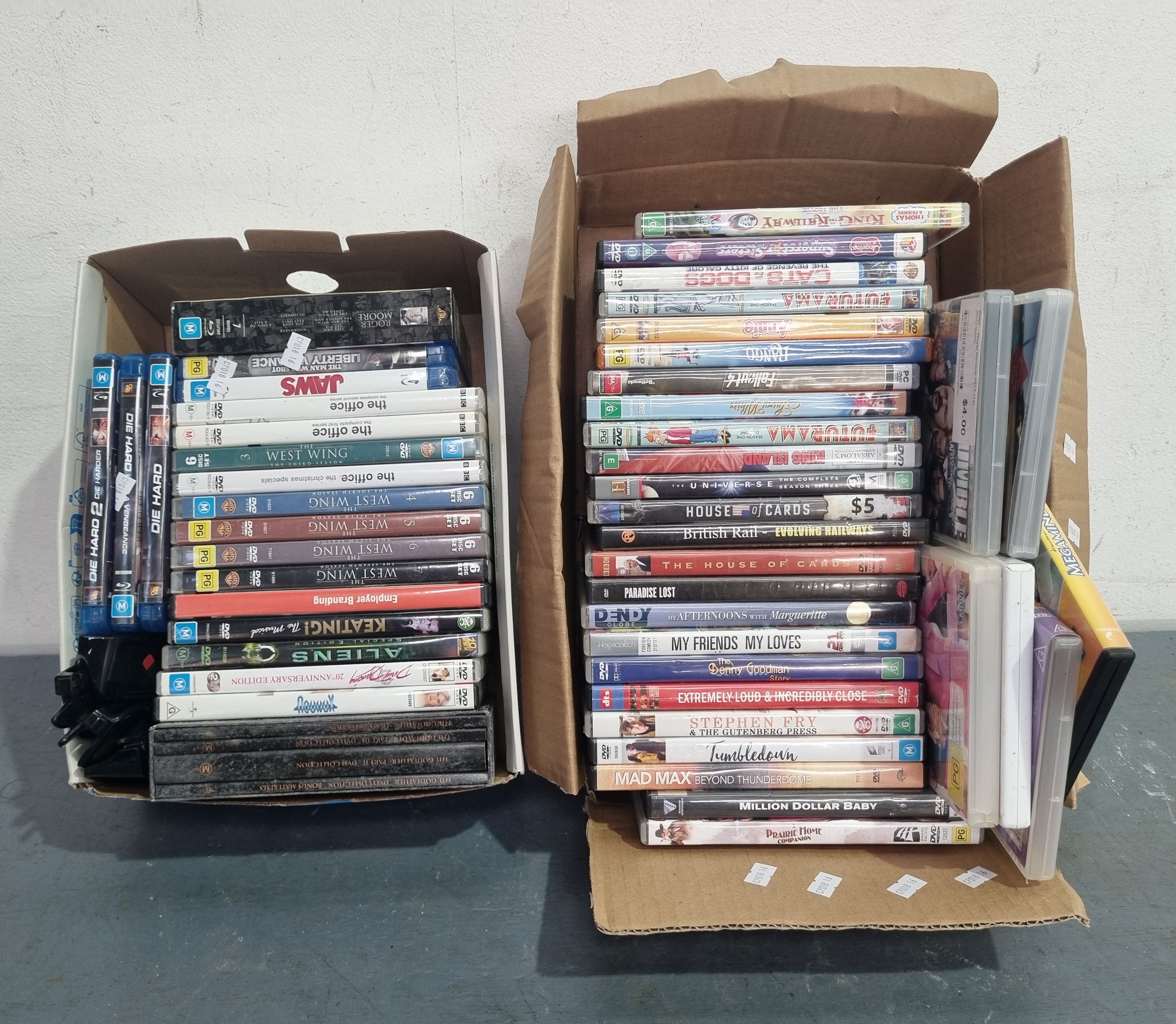 1243 · TWO BOXES OF DVDS